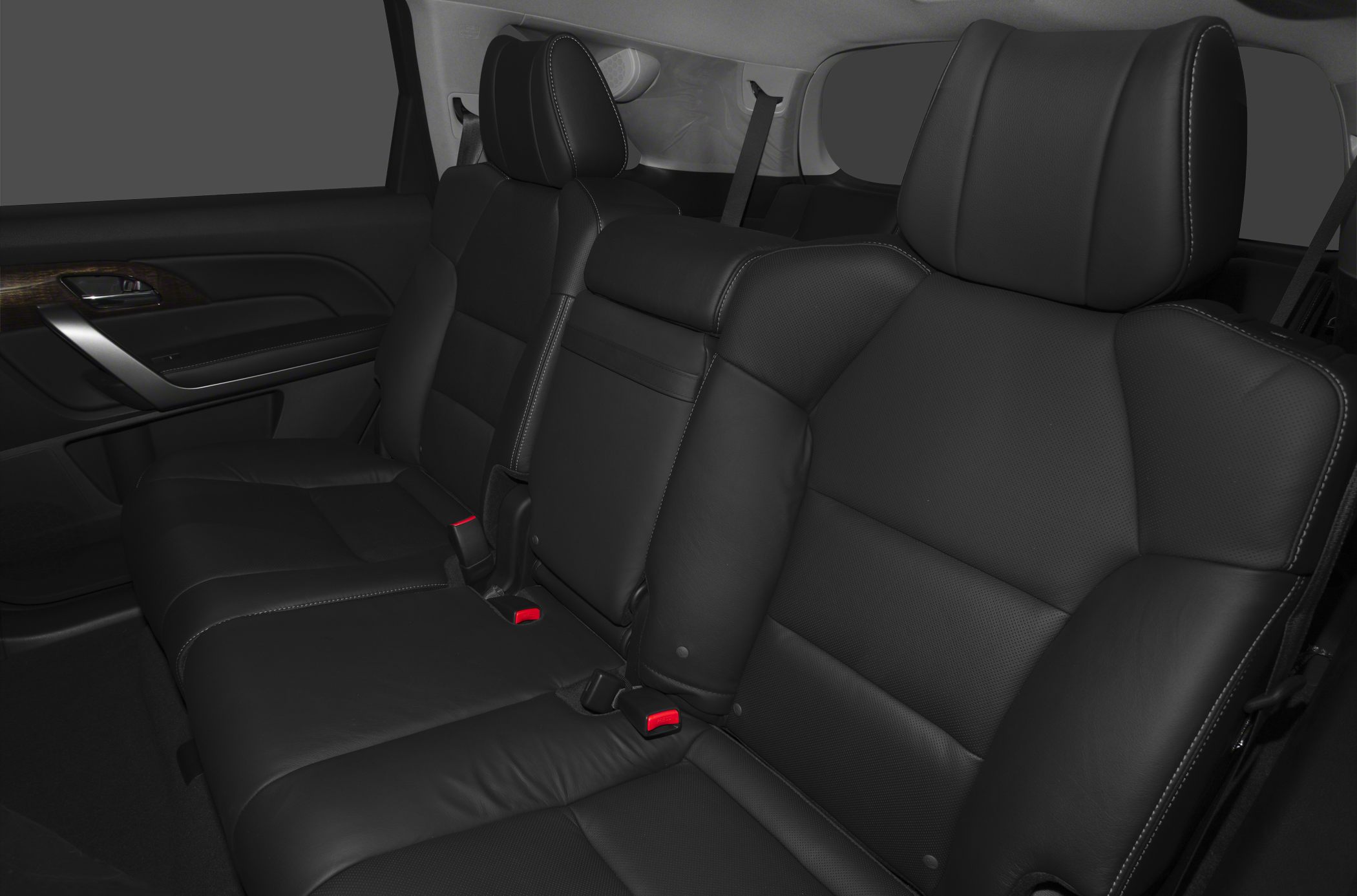 Black leather rear seats with stitching and armrest
