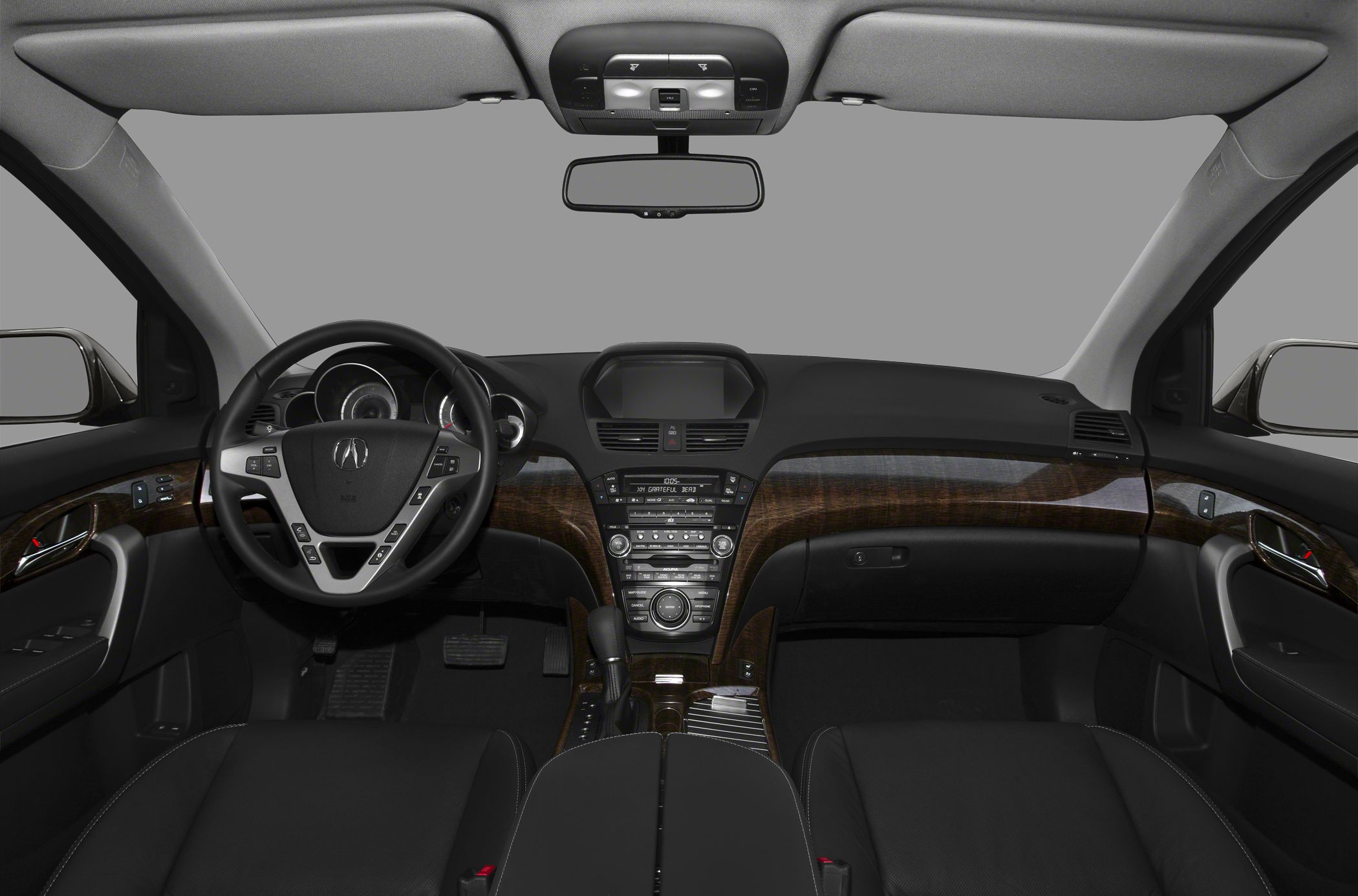Wood trim SUV dashboard with multifunction steering wheel