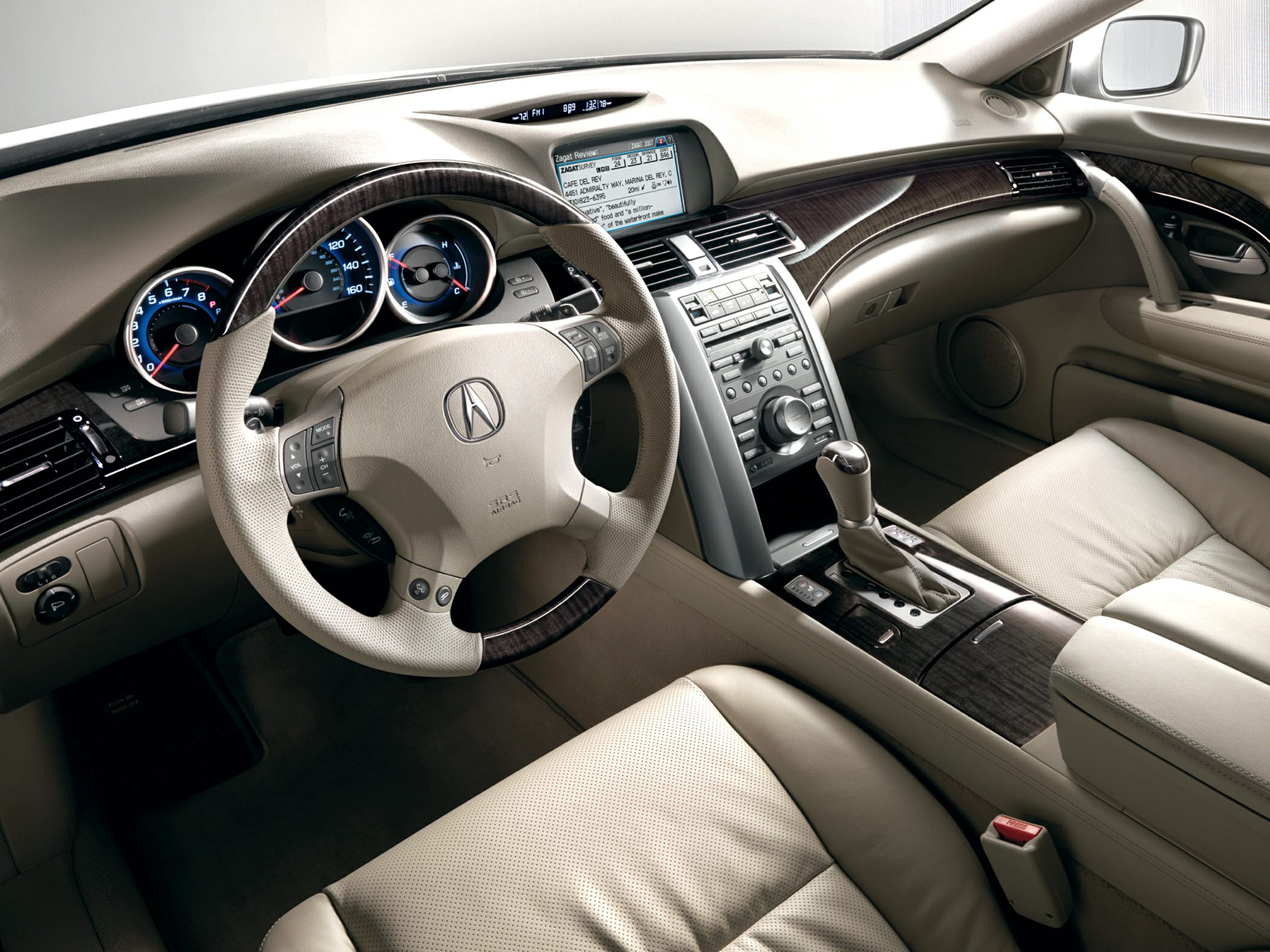 Dashboard, steering wheel, leather seats and wood trim interior