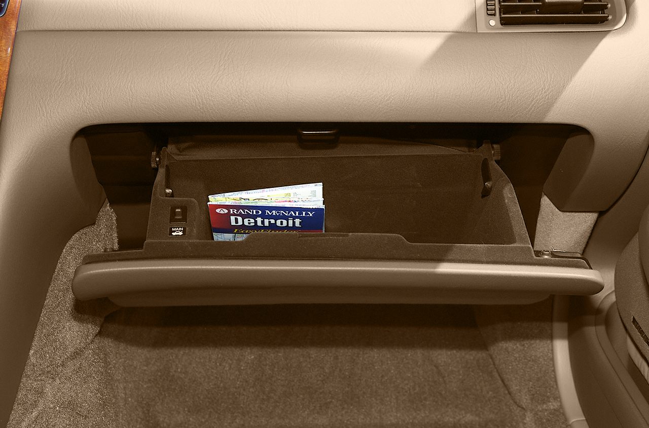 Open glove box compartment with map storage in classic beige interior