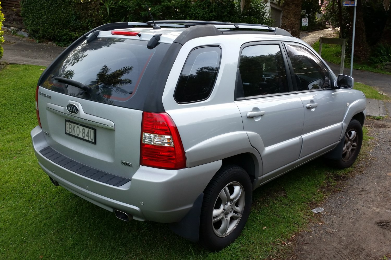 Rear and side view of an SUV with distinctive rear lights and alloy wheels