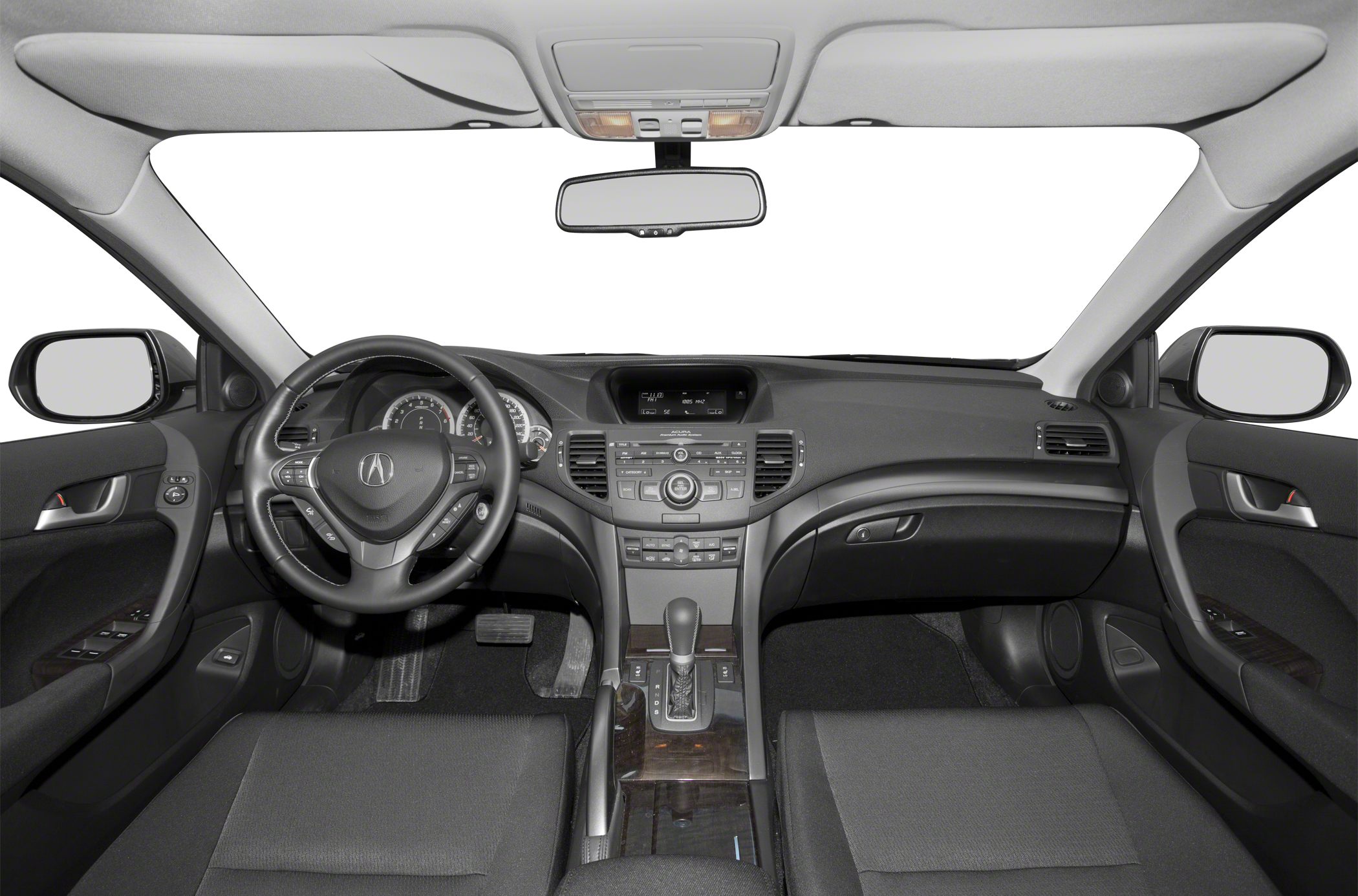Interior dashboard and steering wheel of a car with center console and controls