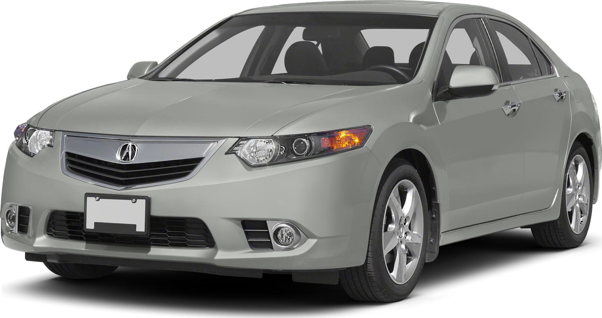 Front view of sedan with distinctive headlights and grille