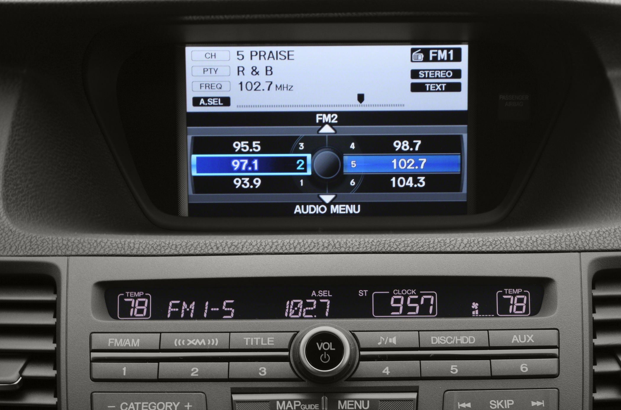 In-dash audio system with FM radio presets and control buttons