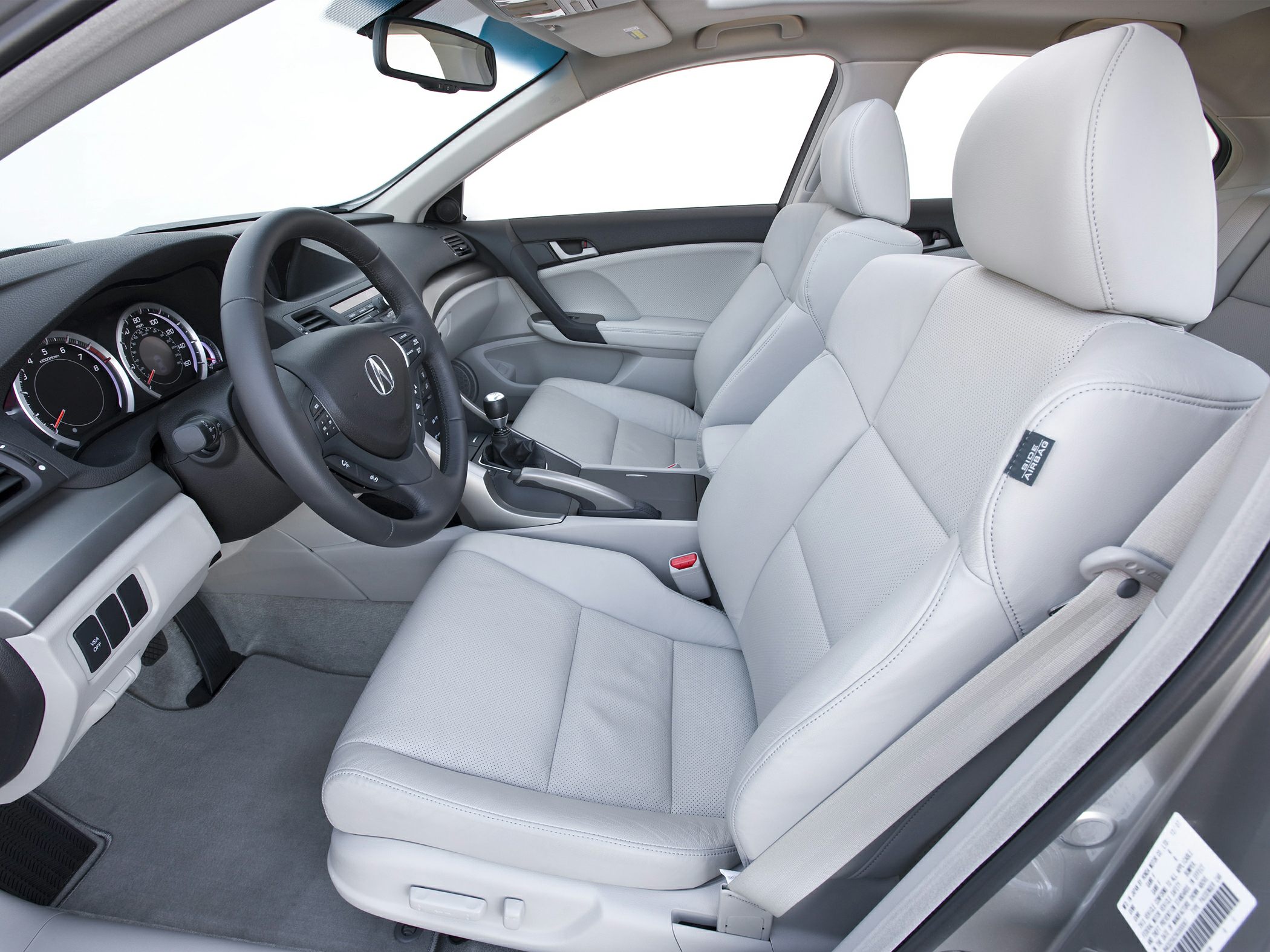 Leather car seats and manual transmission inside a vehicle