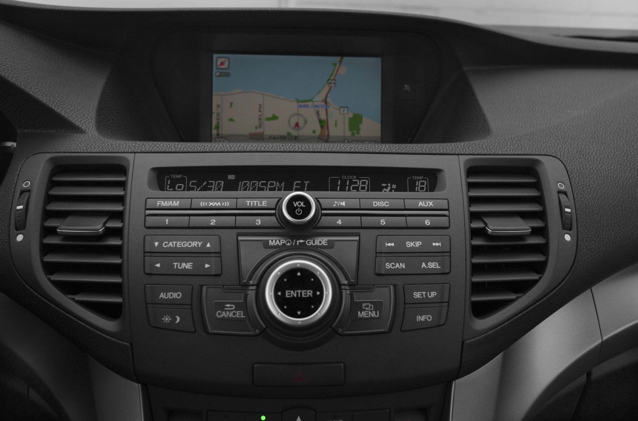 In-dash navigation screen and audio control panel with temperature indicators
