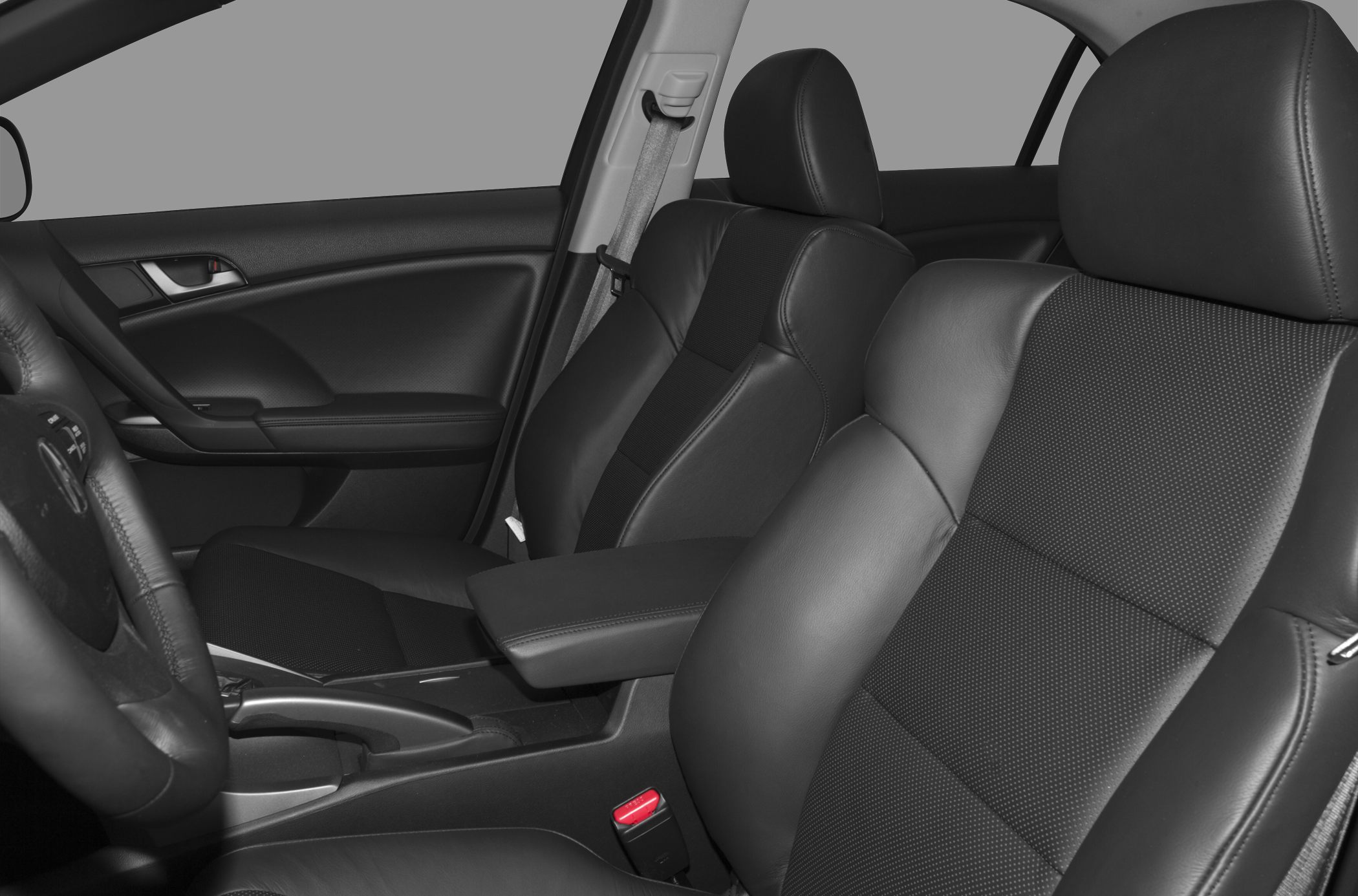 Black leather front seats and armrest in car interior