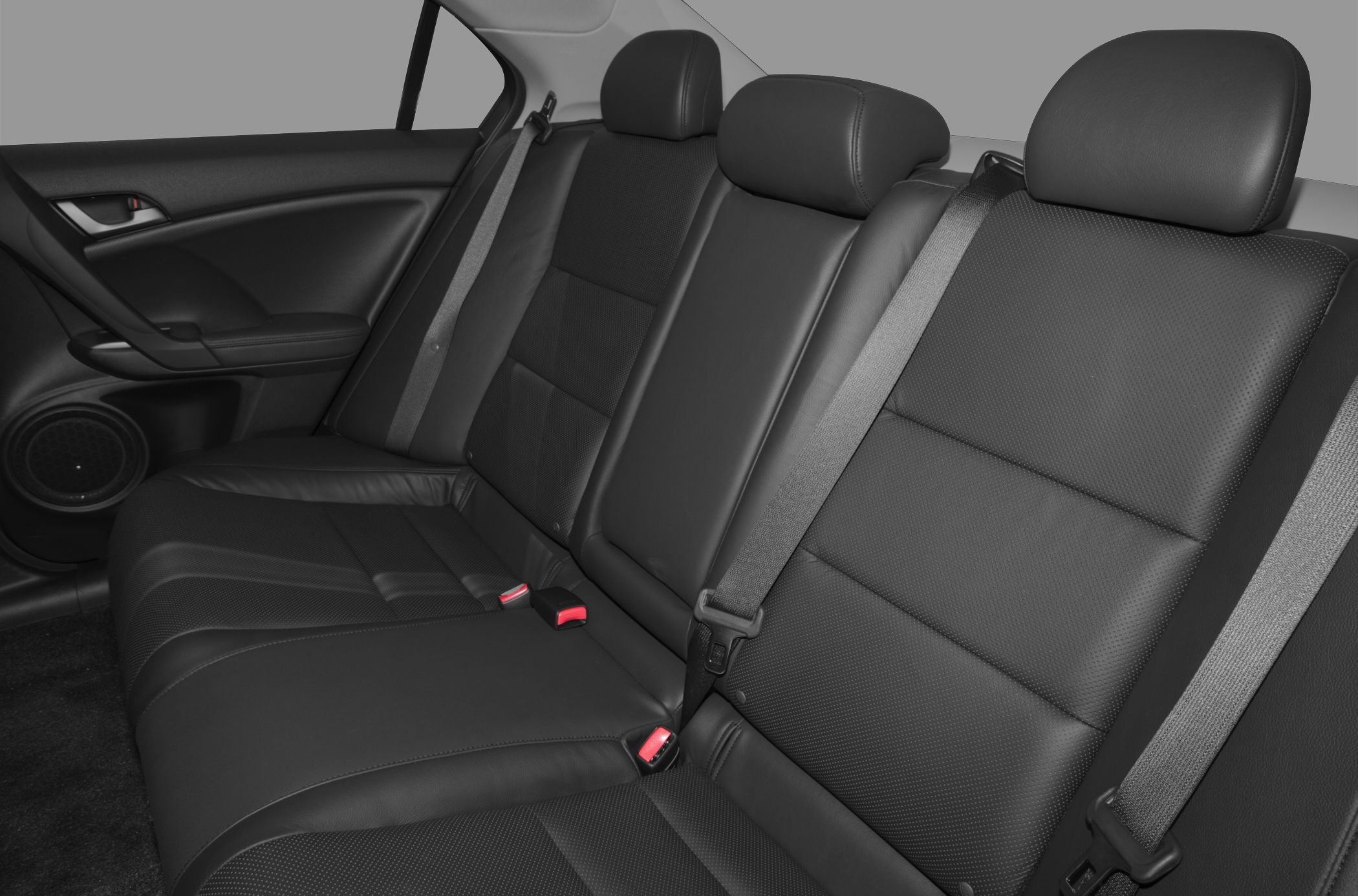 Rear leather seats with headrests and seatbelts
