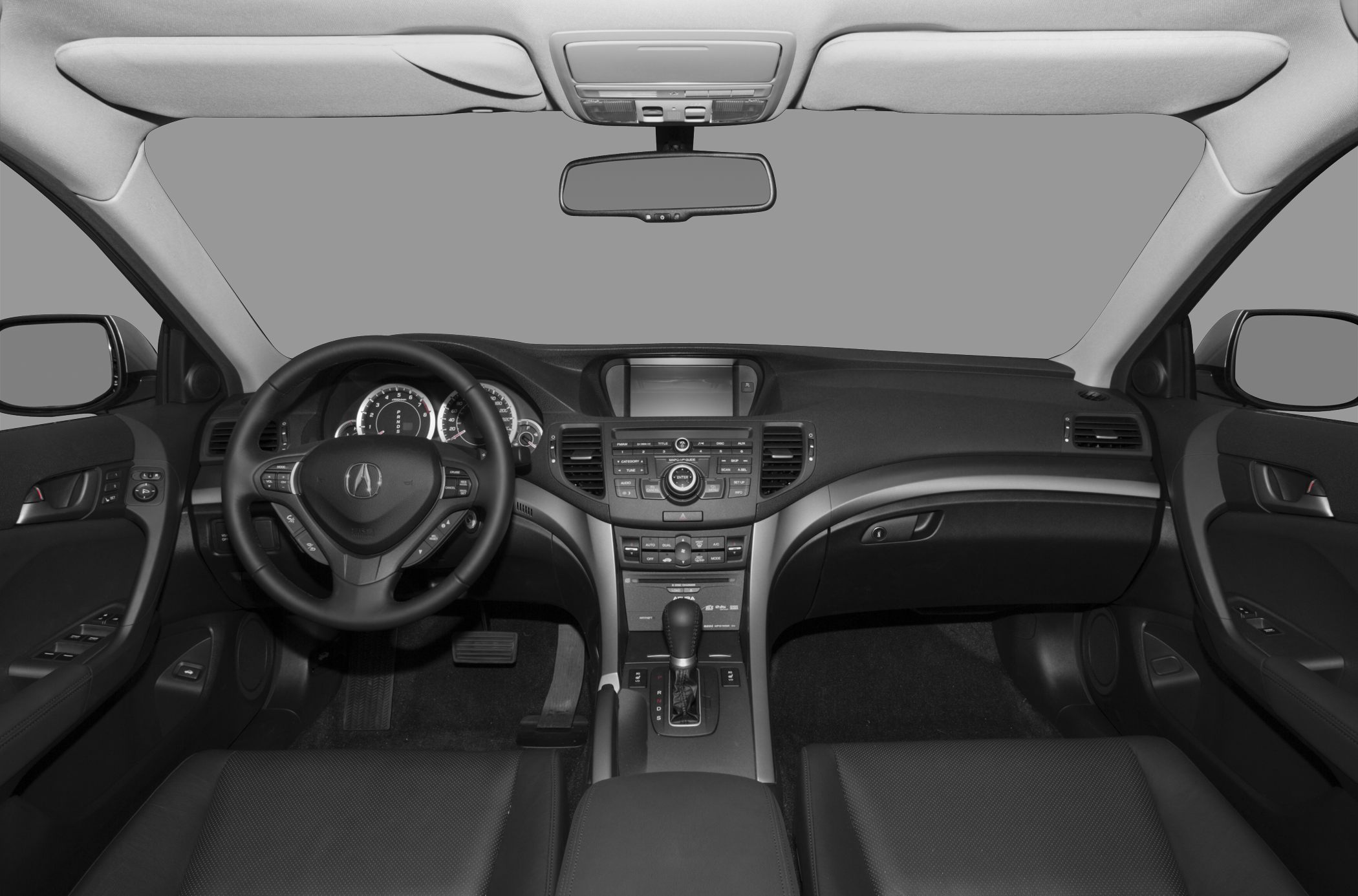 Dashboard, steering wheel with buttons, and center console of a modern car interior