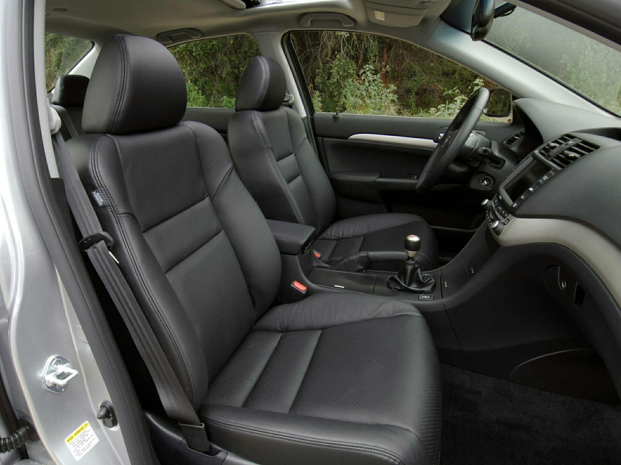 Black leather seats and manual transmission gear shift