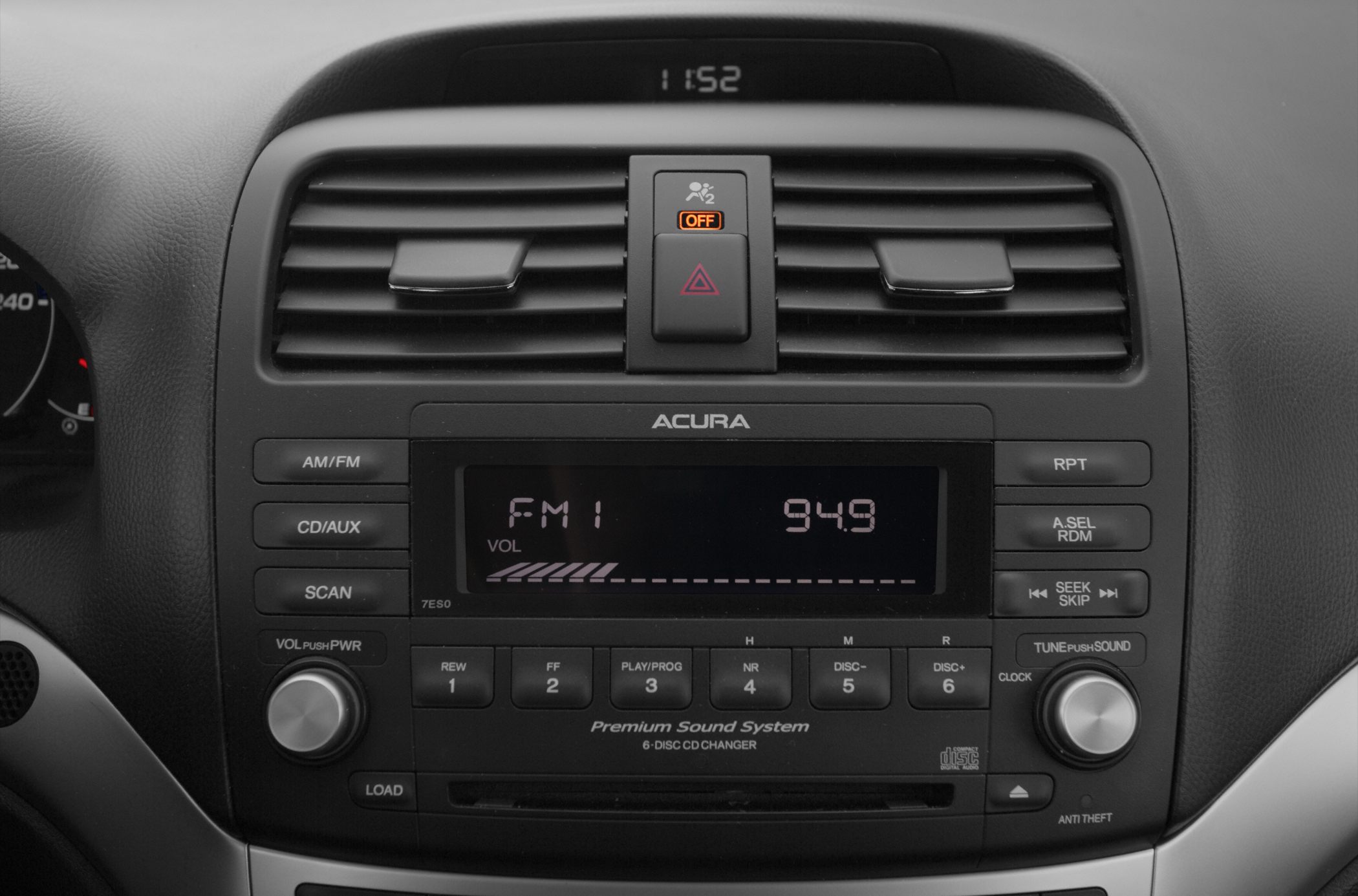 Car dashboard with premium sound system and air vents