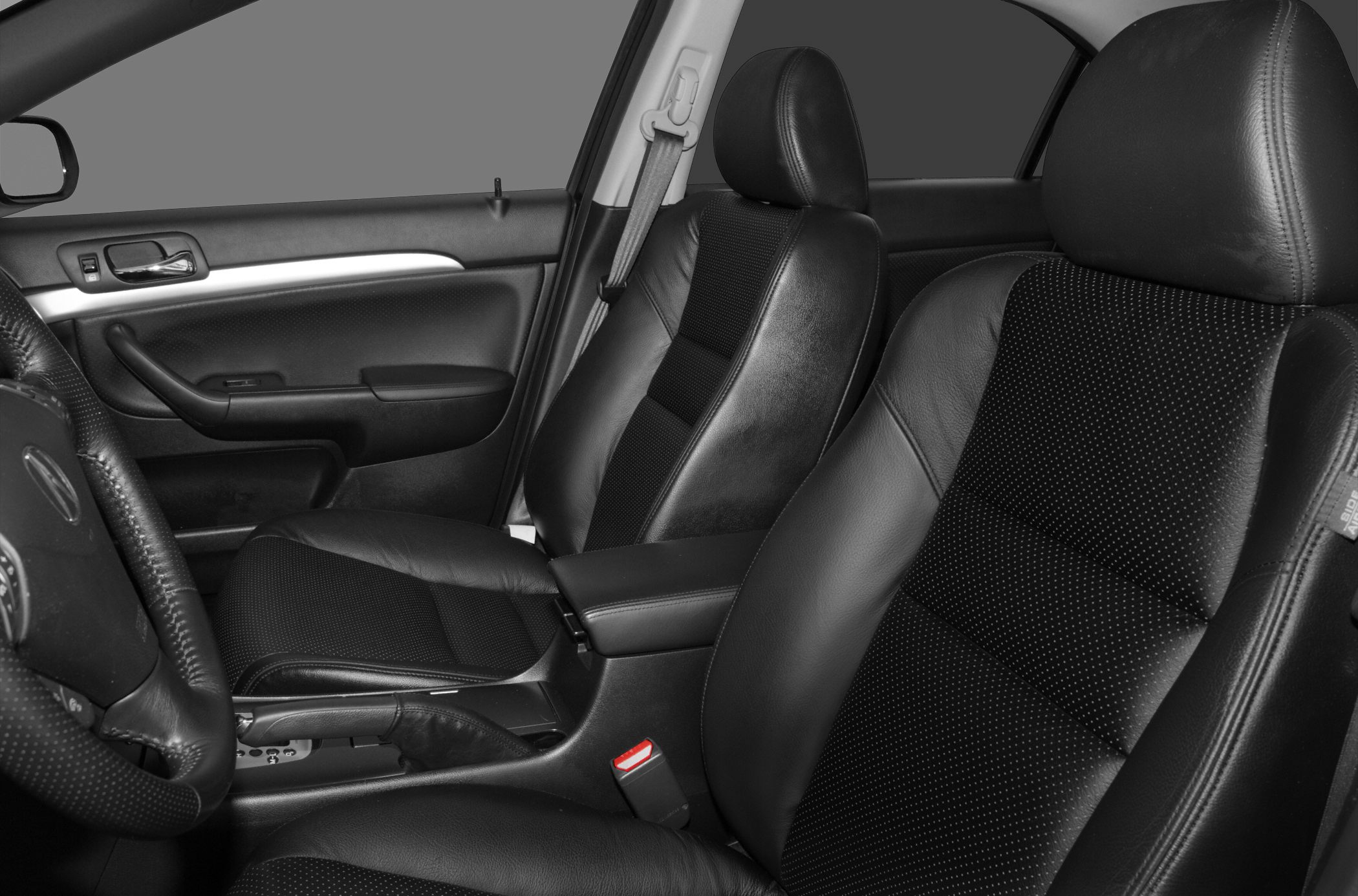 Black leather front seats and central console with seatbelt