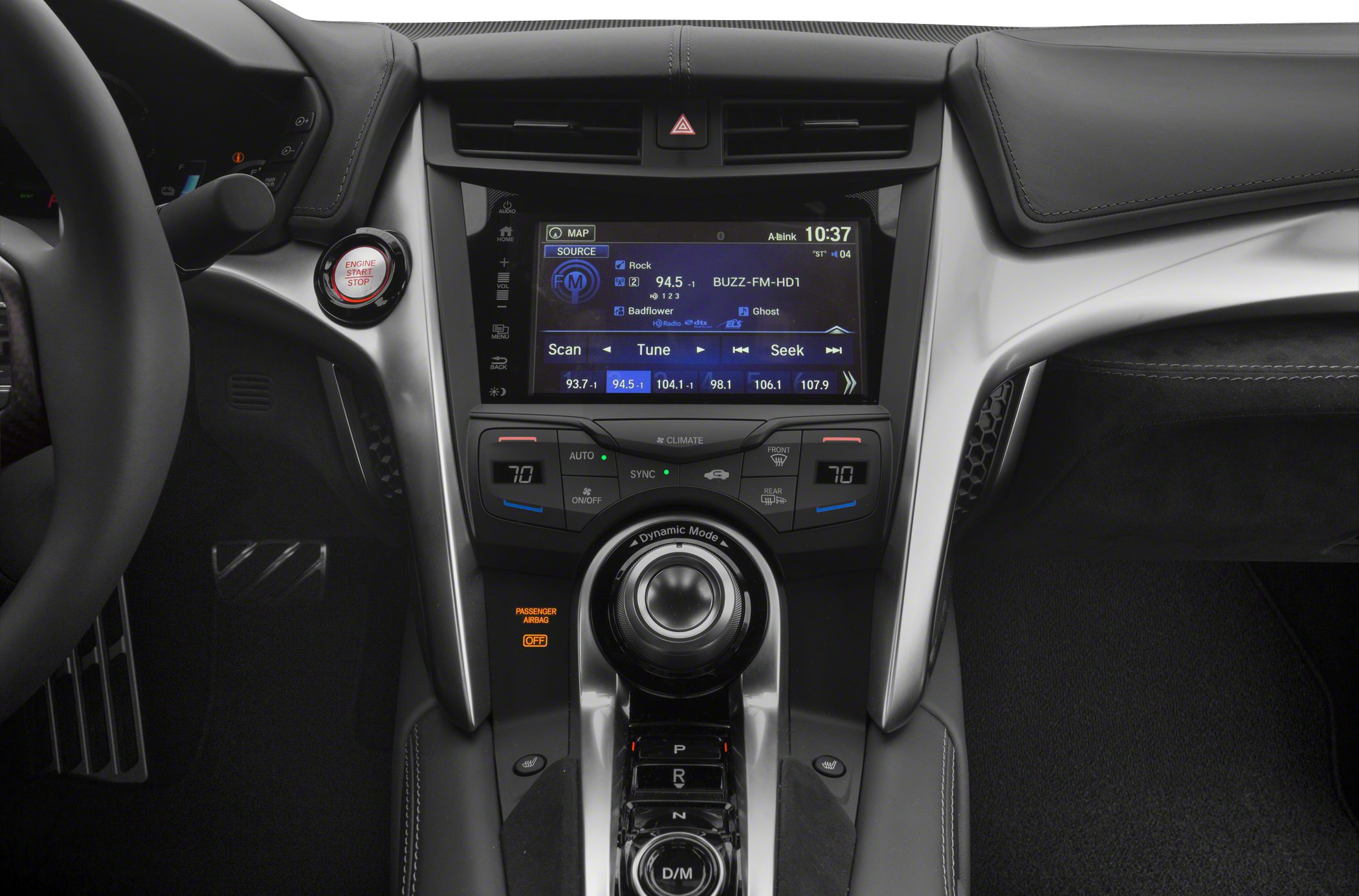 Center console with touchscreen infotainment and dynamic mode dial