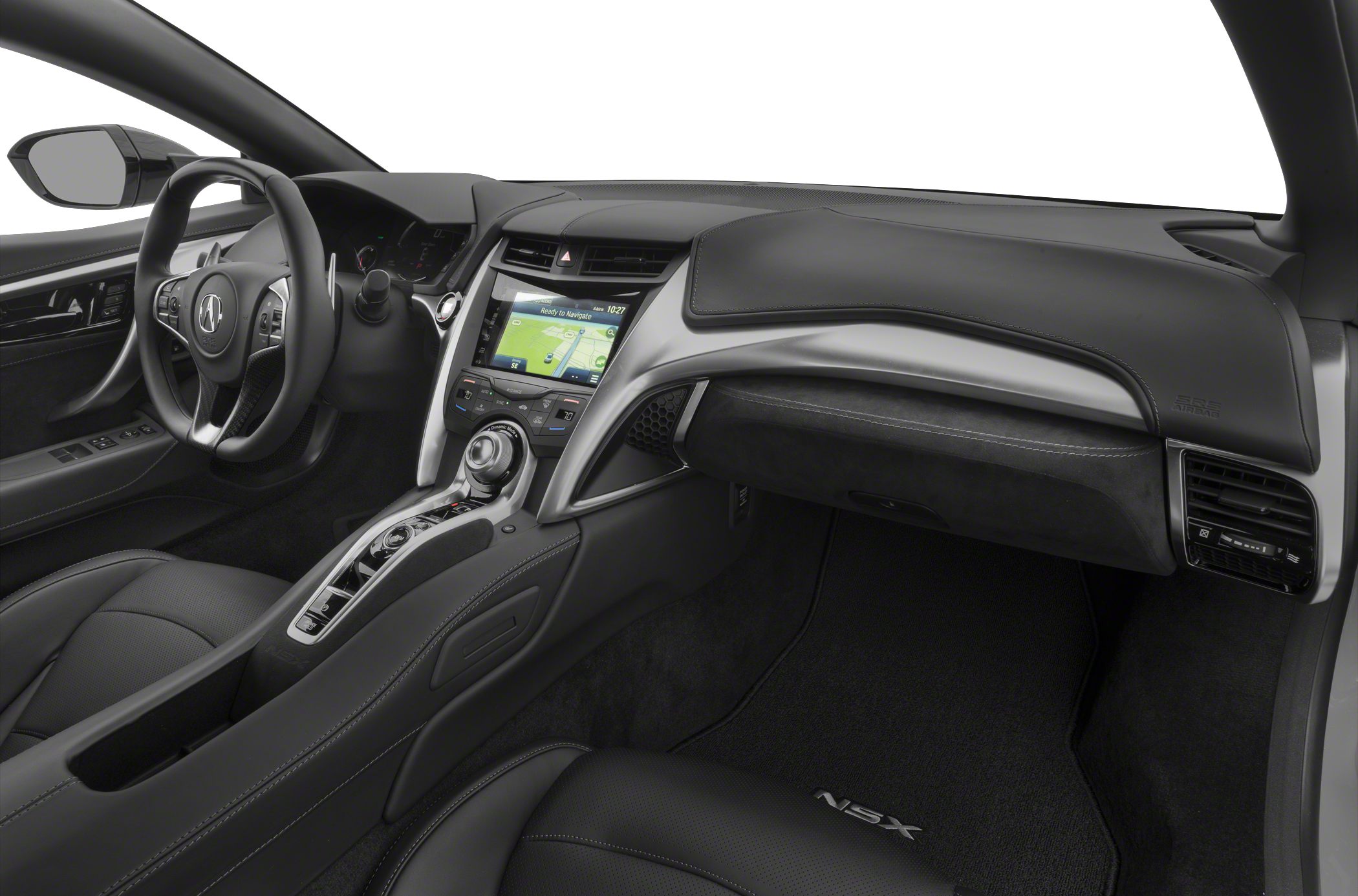 Modern car interior with touchscreen, ergonomic steering wheel, and center console controls.