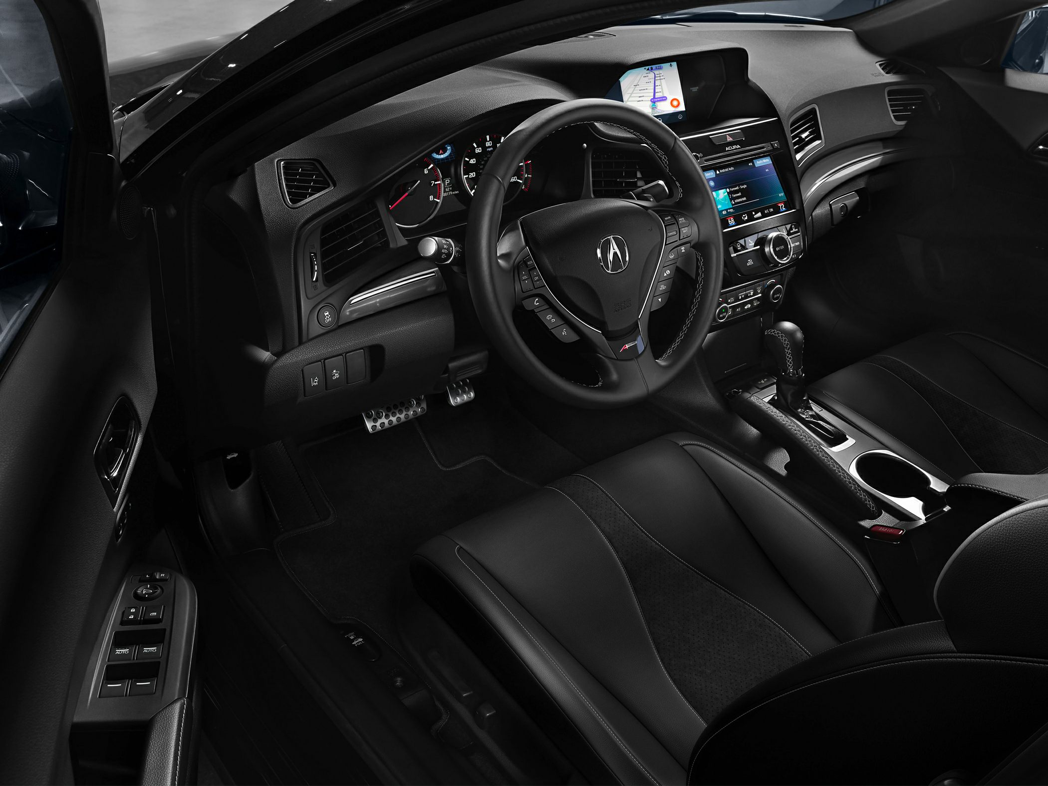Modern dashboard, steering wheel with controls, dual touchscreen displays