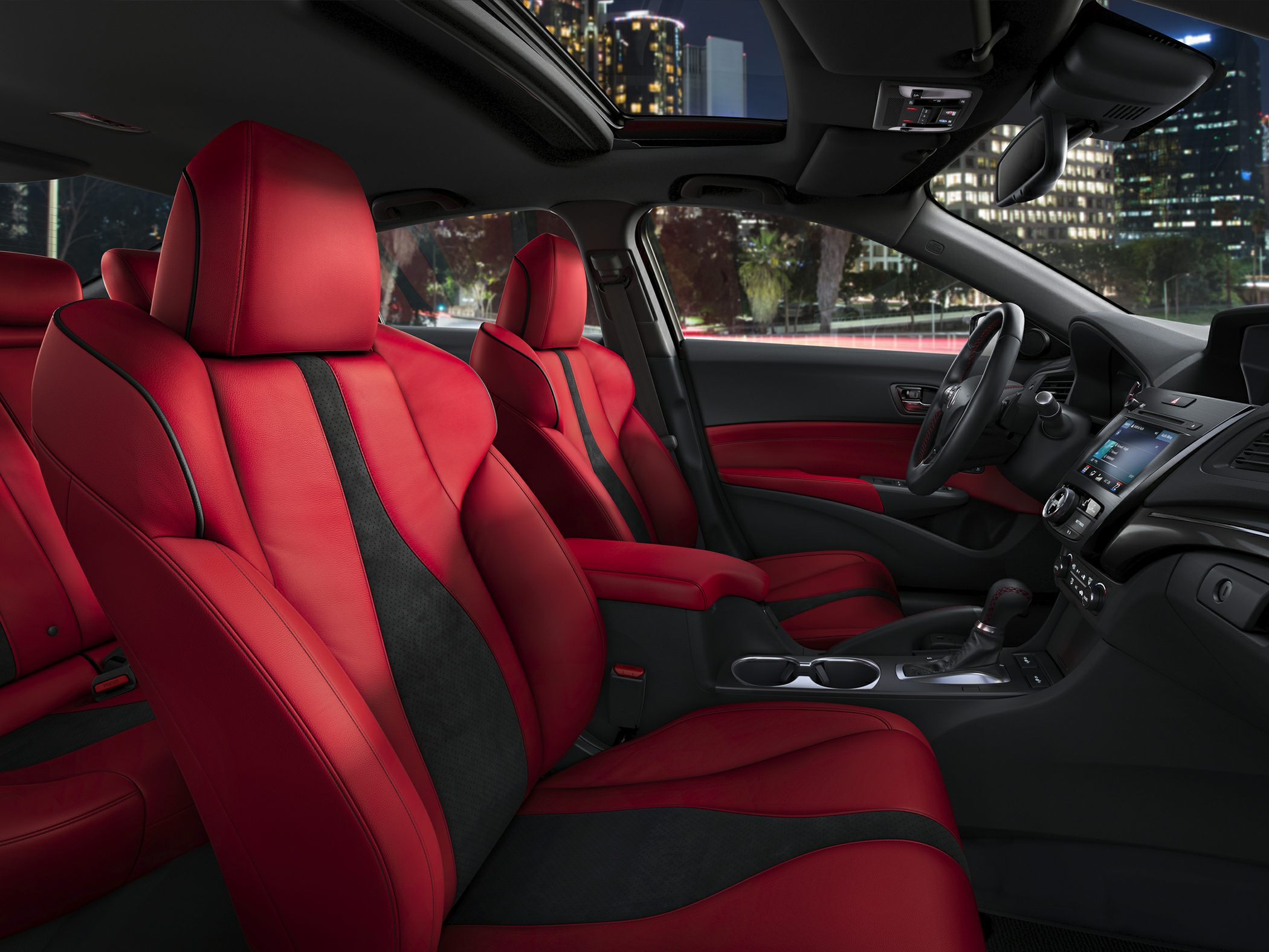Red and black leather seats with panoramic sunroof and advanced dashboard