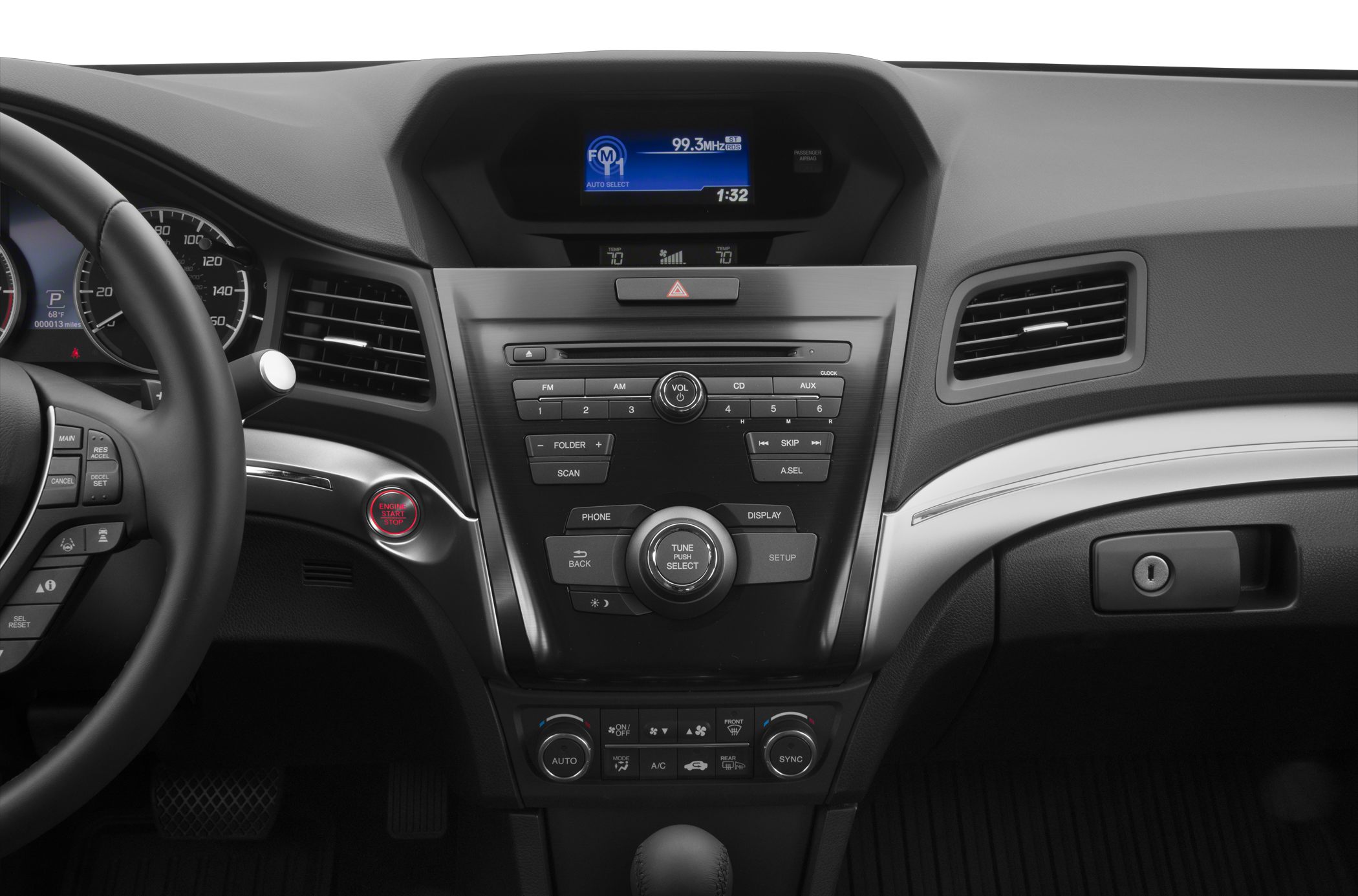 Car dashboard with digital display, infotainment system, and push start button