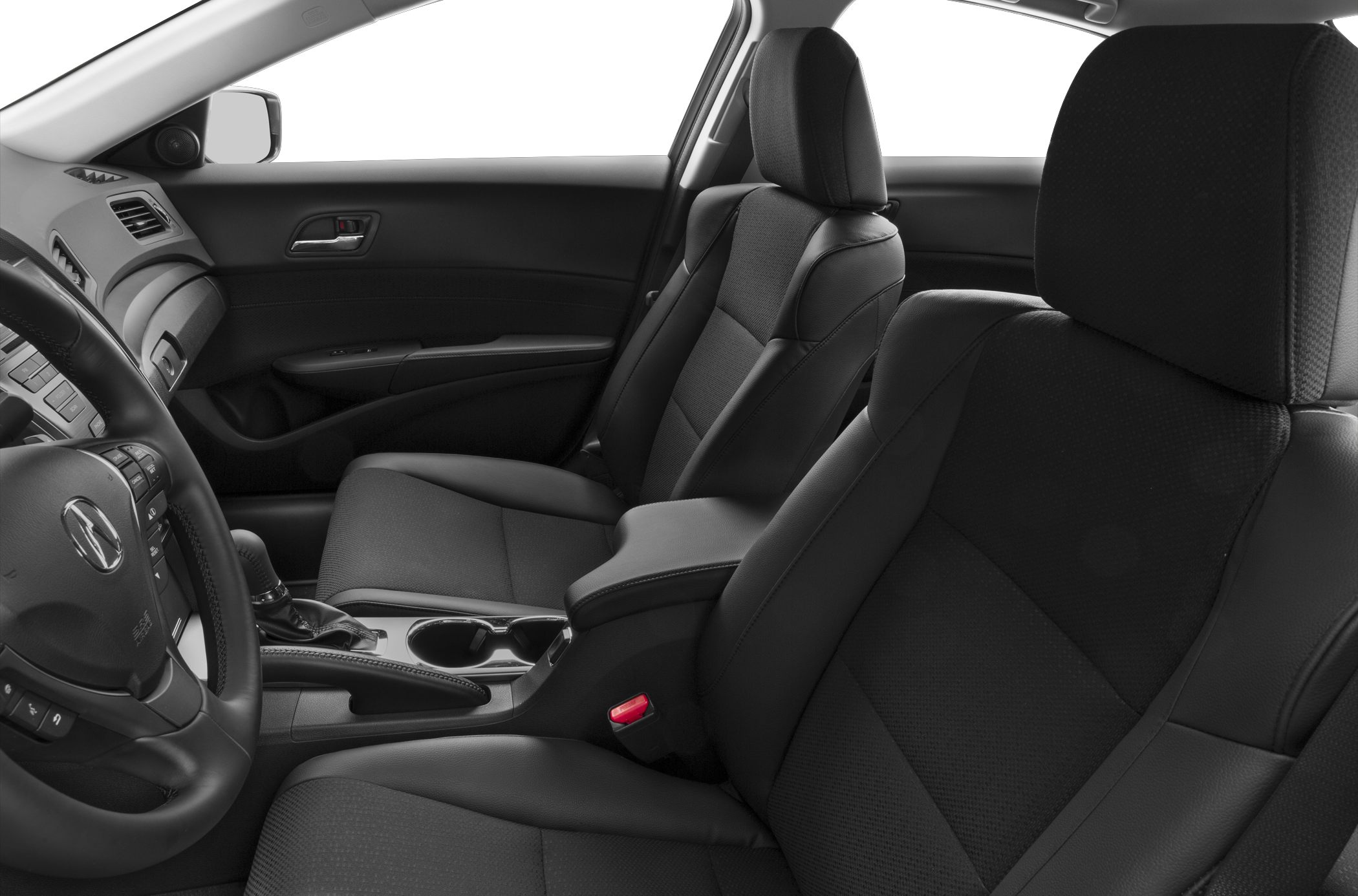 Front seats and dashboard interior with upholstery and controls.