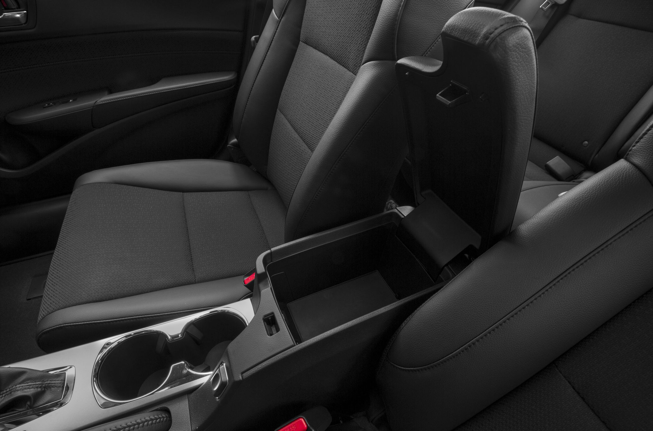 Black fabric and leather front seat with open center console storage