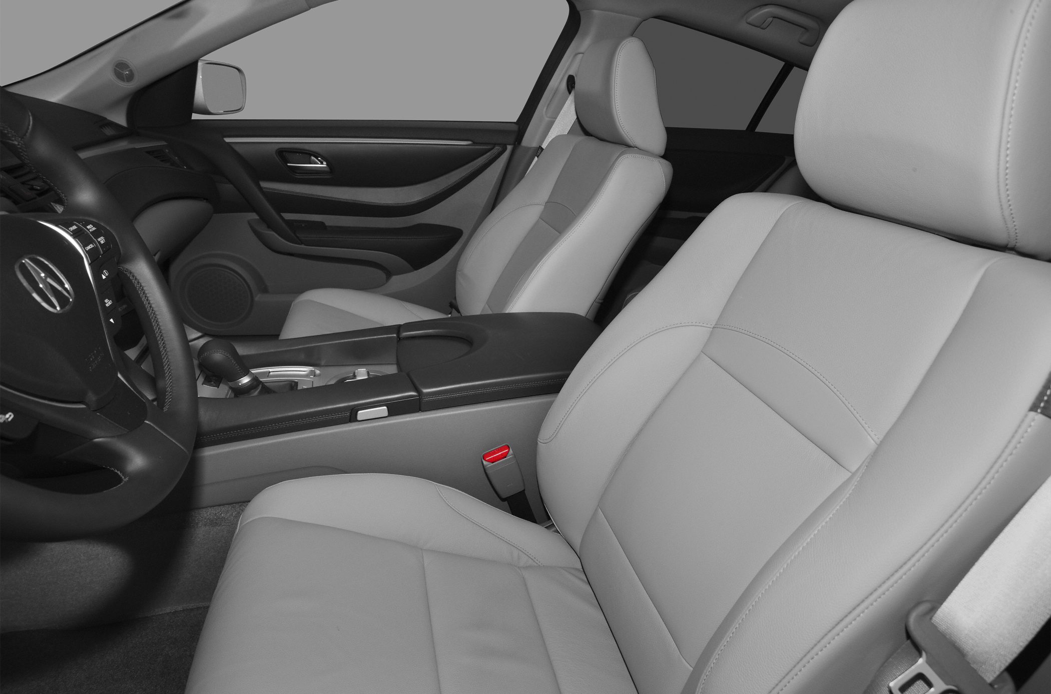 Front leather seats and steering wheel in car interior