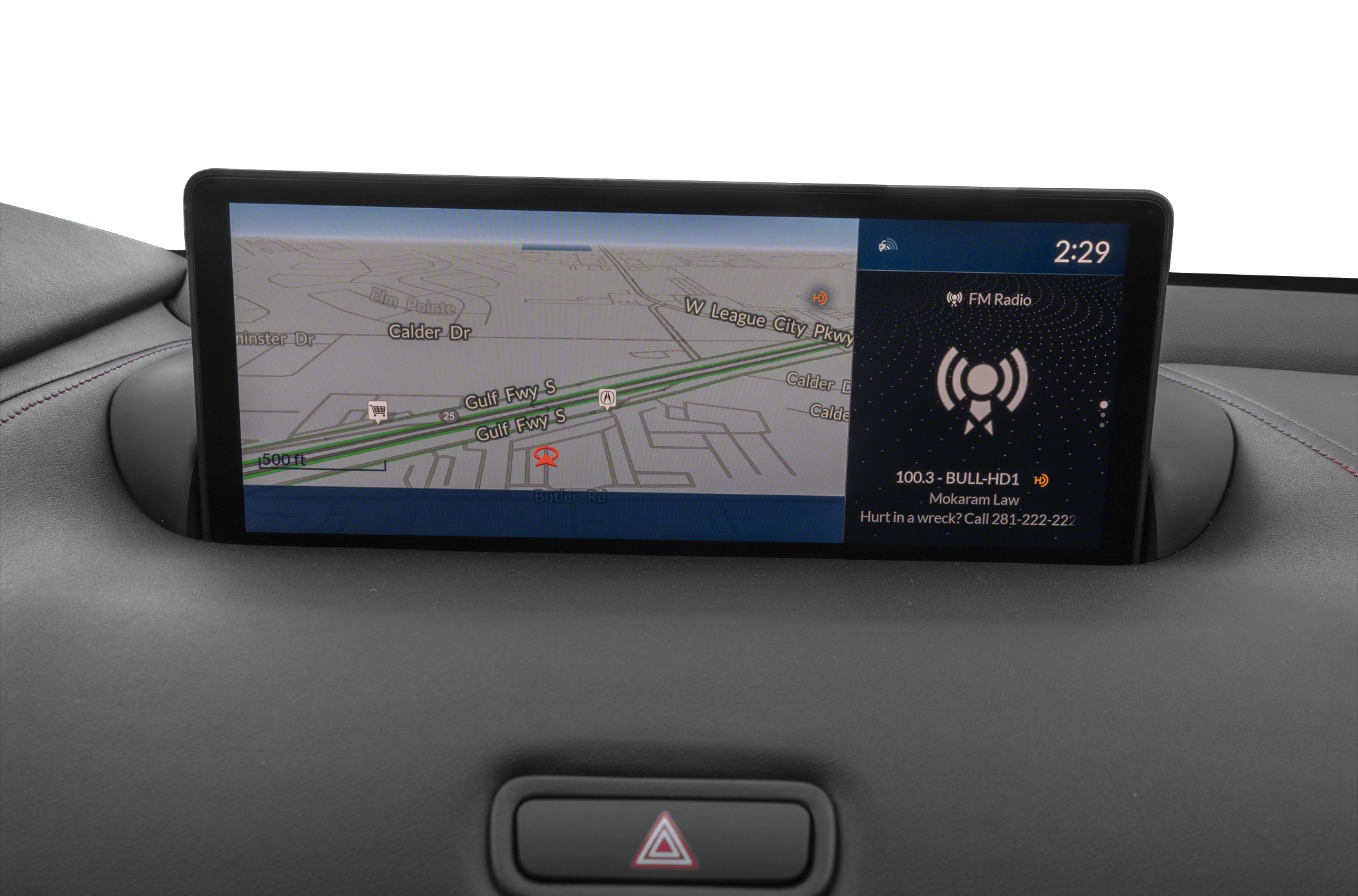 Dual-screen car infotainment showing navigation map and FM radio