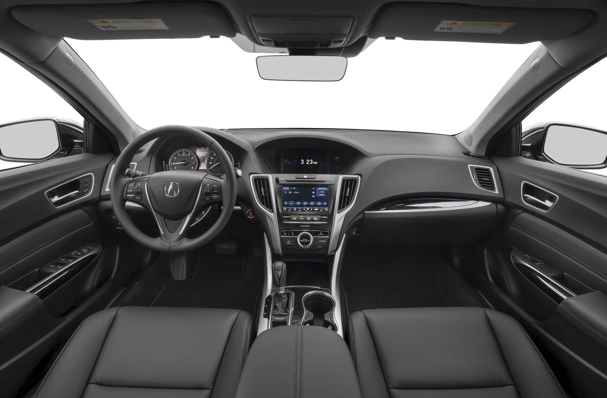 Interior dashboard, steering wheel, and center console with infotainment system