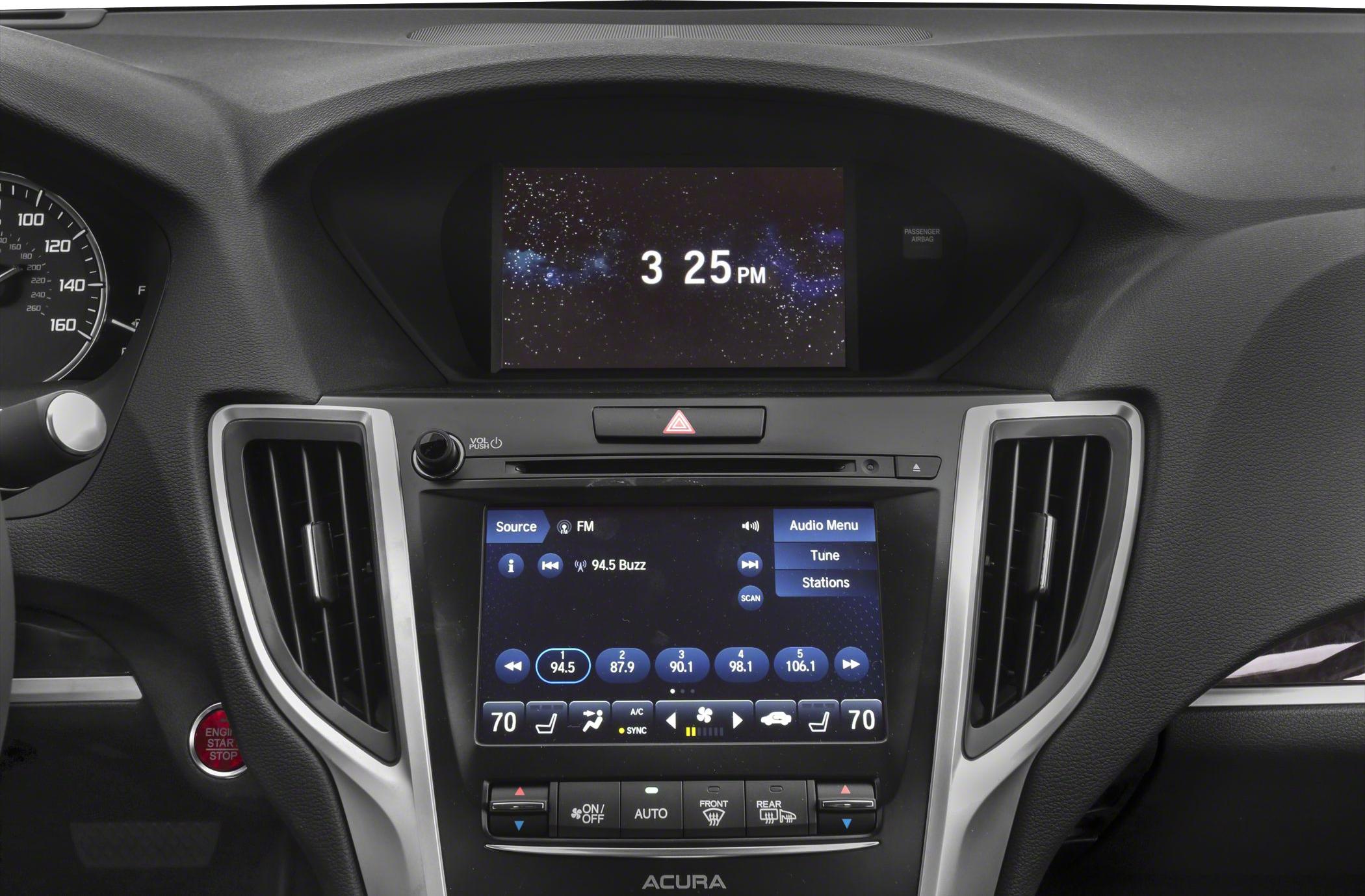 Dual-screen infotainment system with climate controls and start button