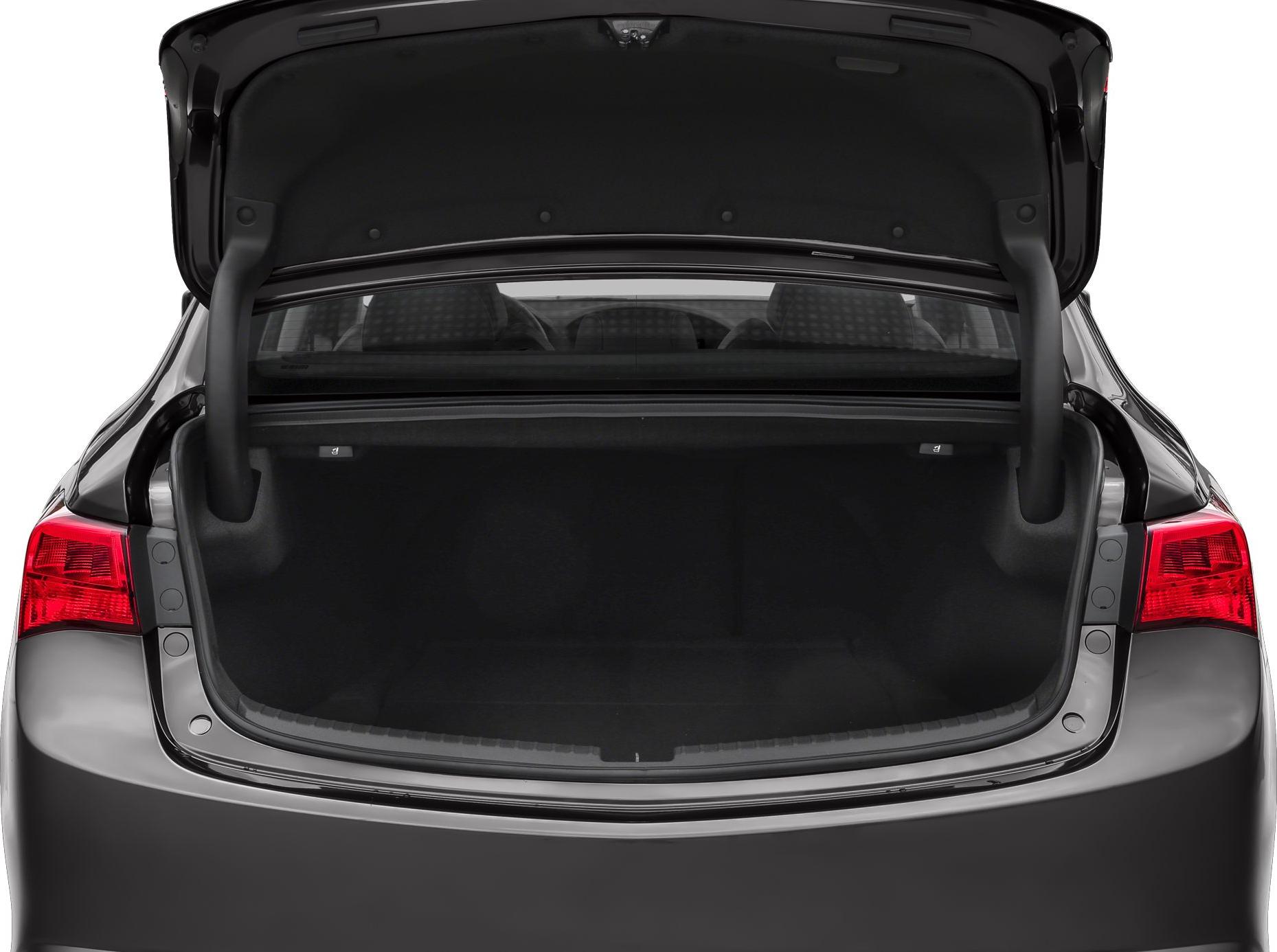 Spacious open rear trunk with visible rear seats.