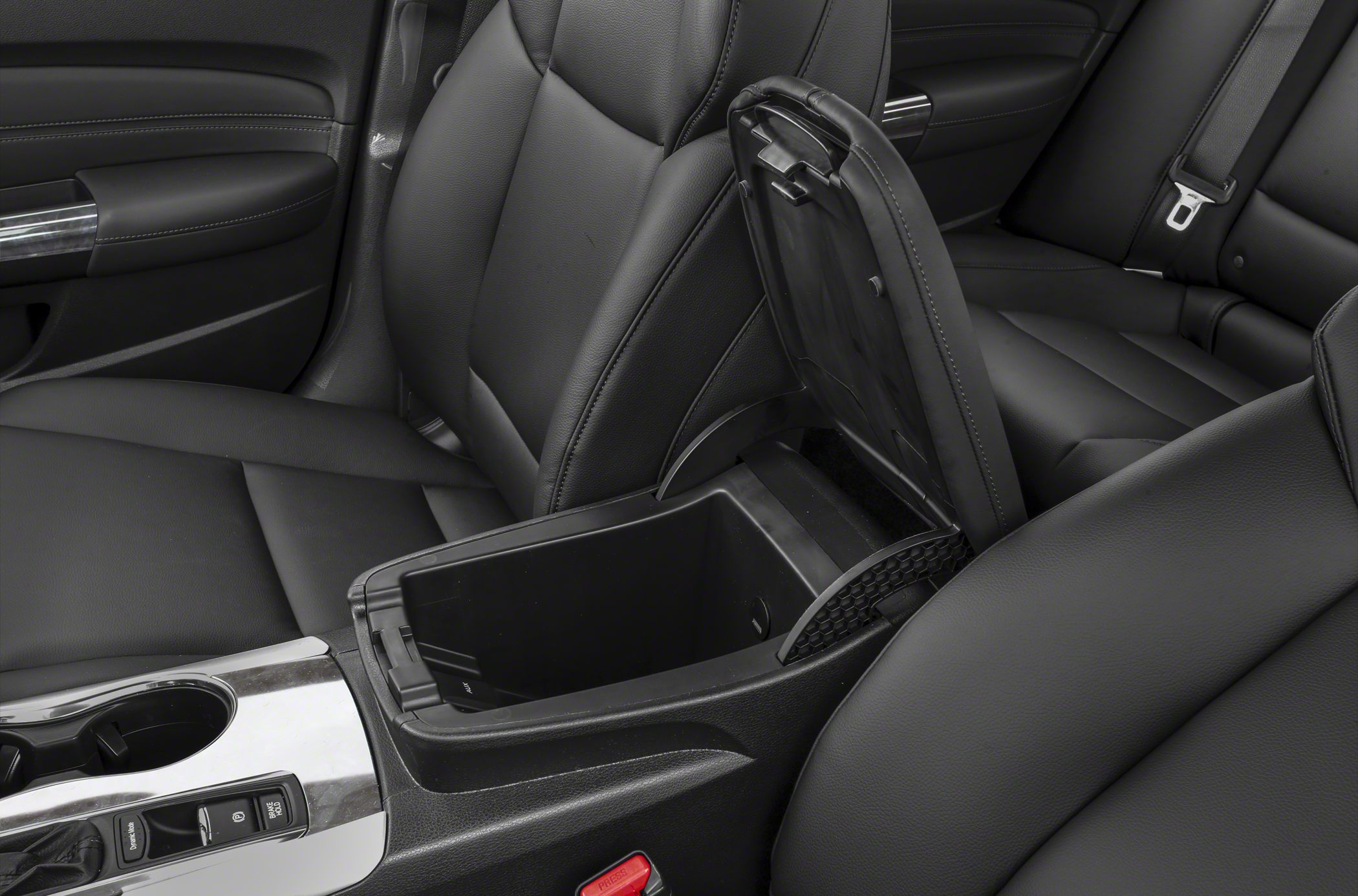 Open center console storage in black leather interior