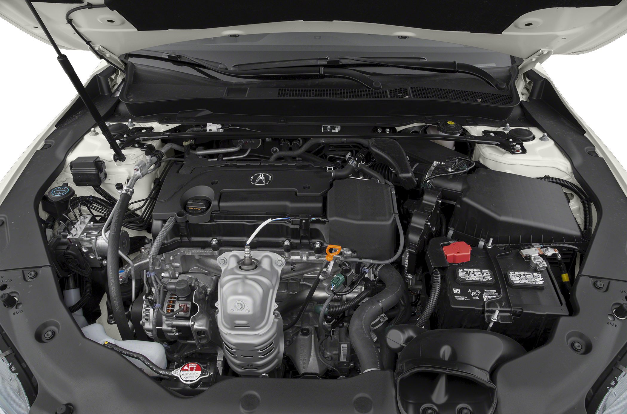 Engine bay showing mechanical components and battery under the hood.