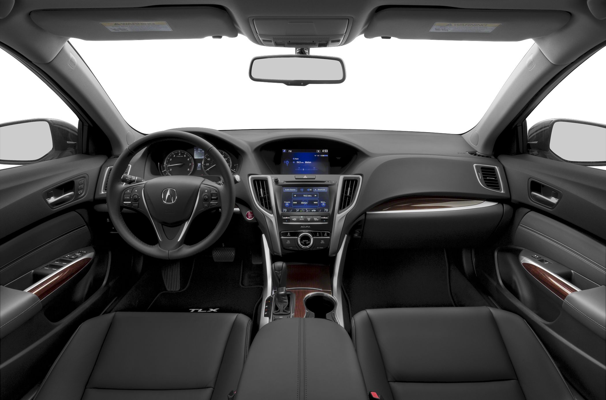 Interior view of a dashboard with dual display screens and a multifunction steering wheel.