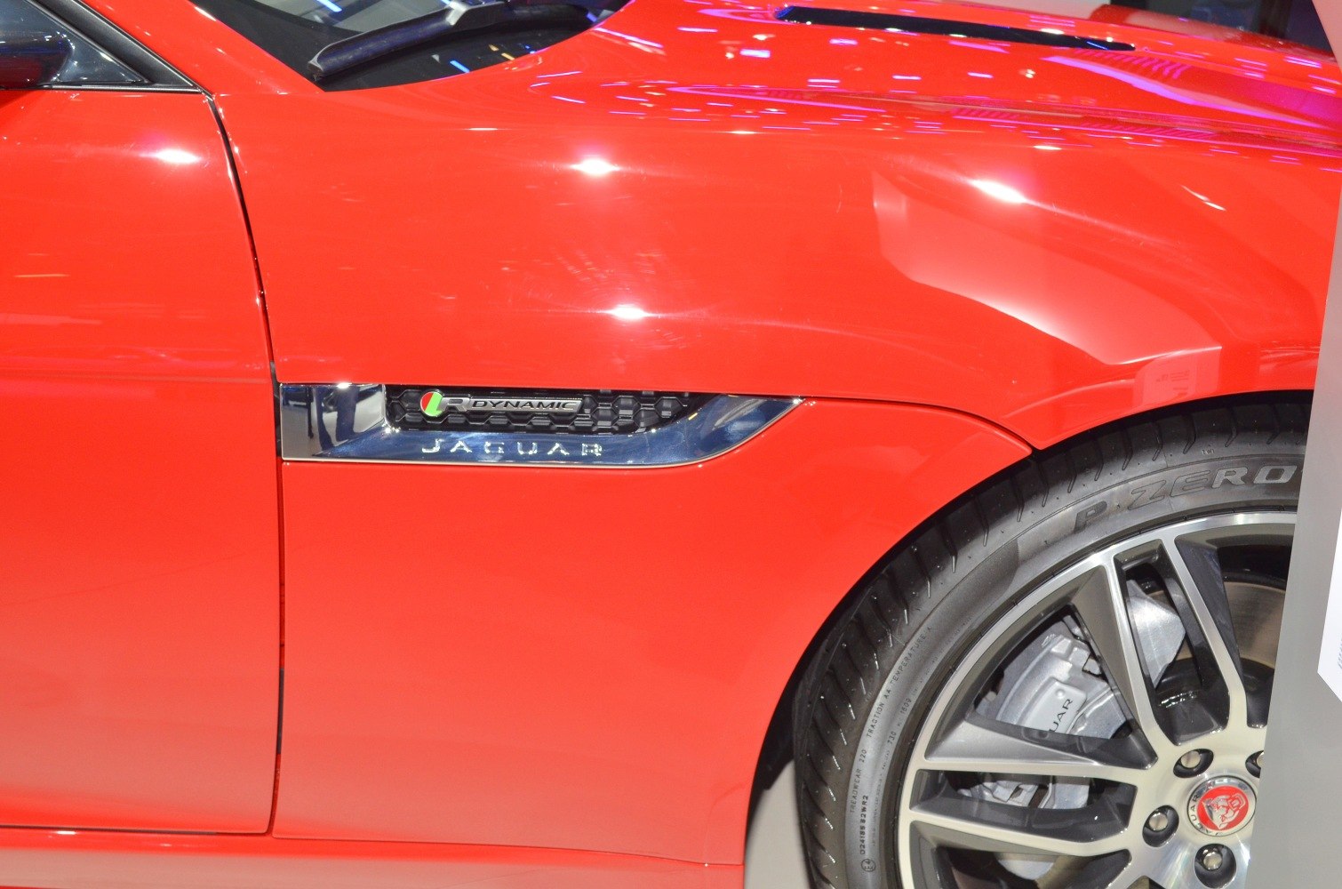 Side fender badge and front wheel with sporty alloy rim and tire