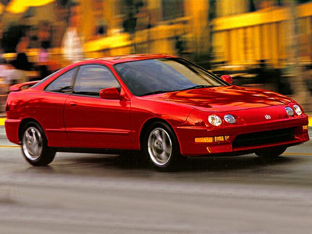 Red sporty two-door fastback with quad headlights