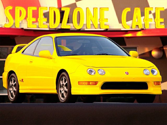 Bright yellow coupe with aerodynamic body and circular headlights
