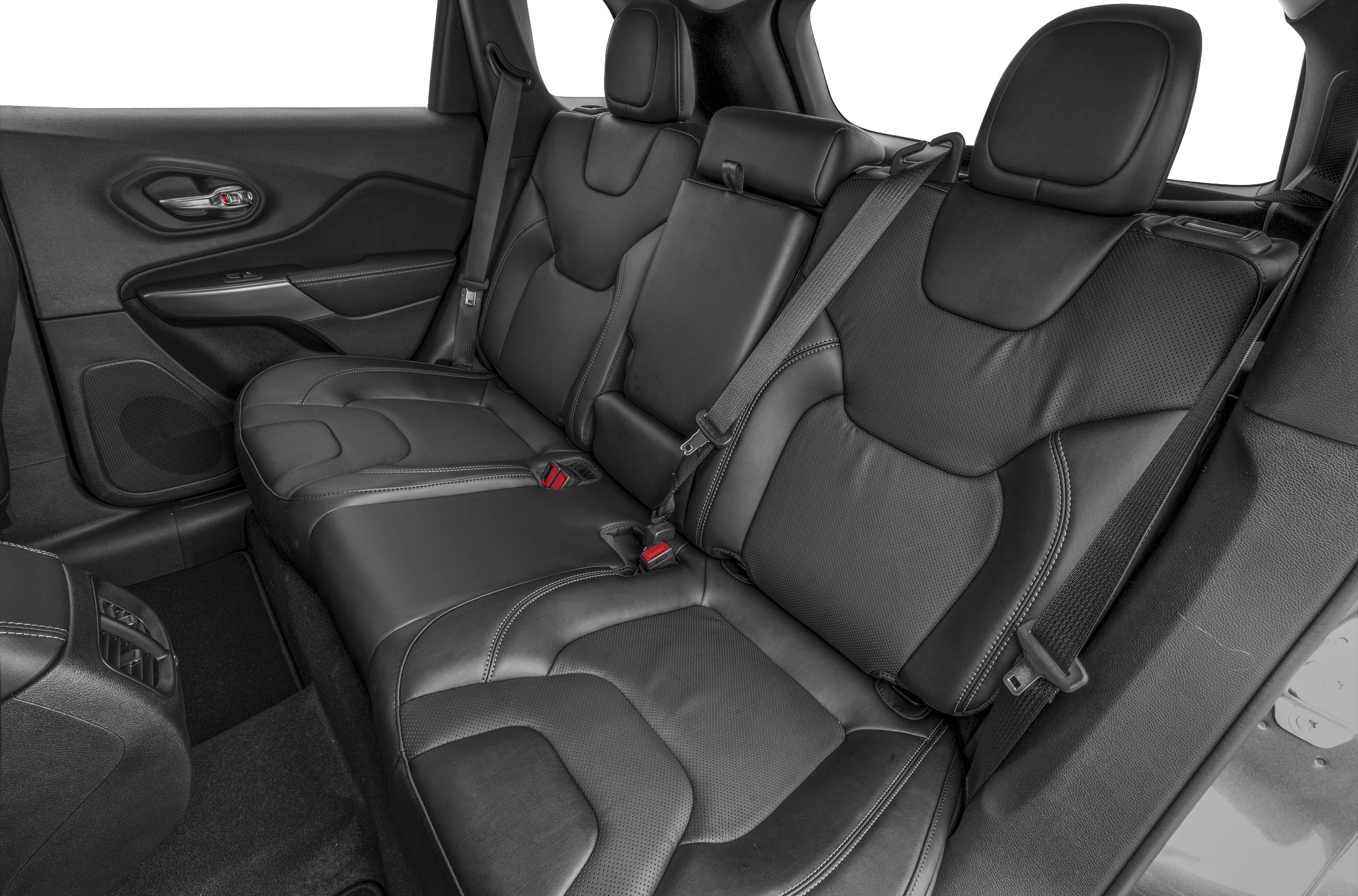 Premium black leather rear seats with safety belts and detailed stitching