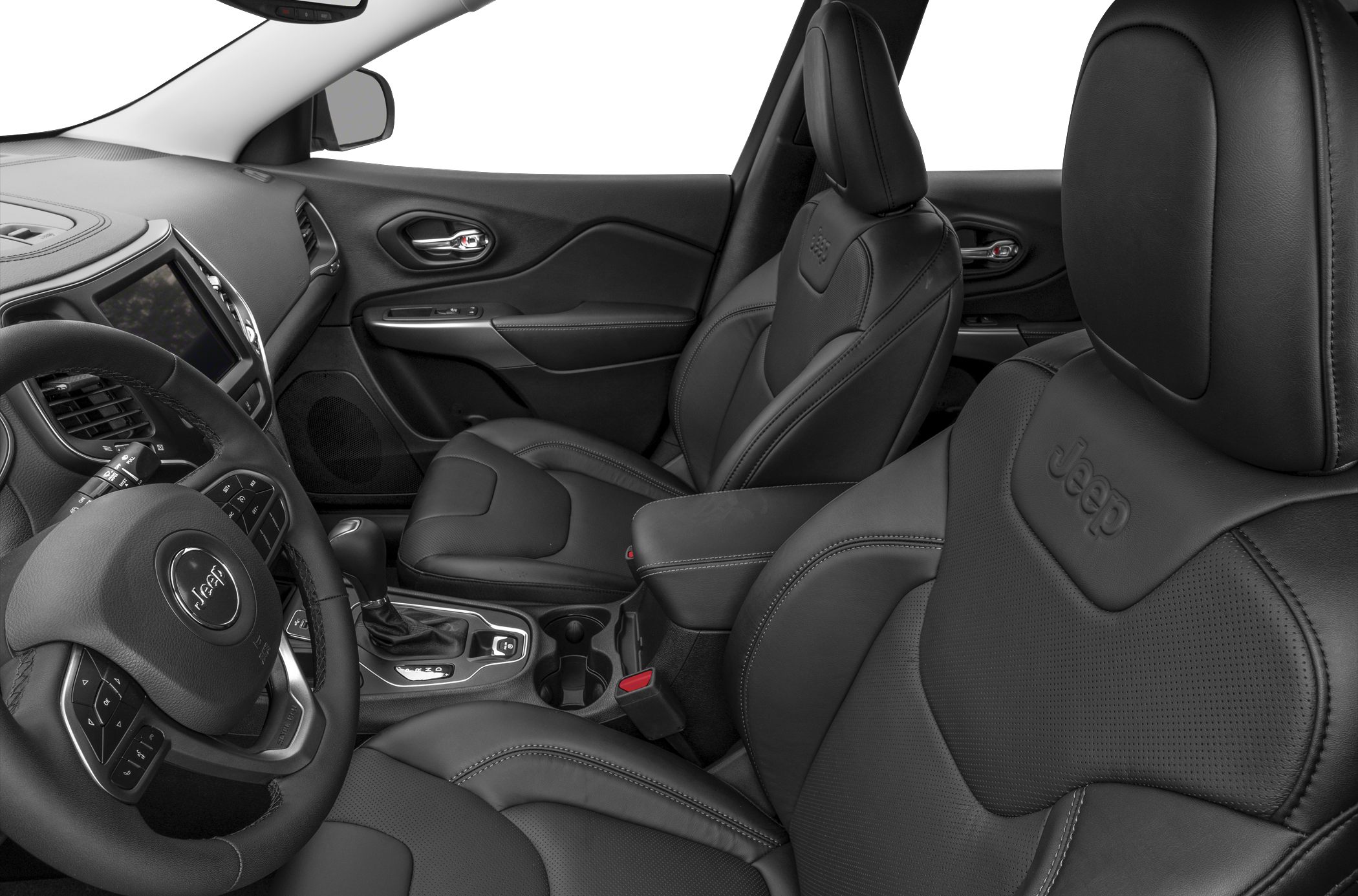Close-up of black leather front seats and steering wheel with console controls