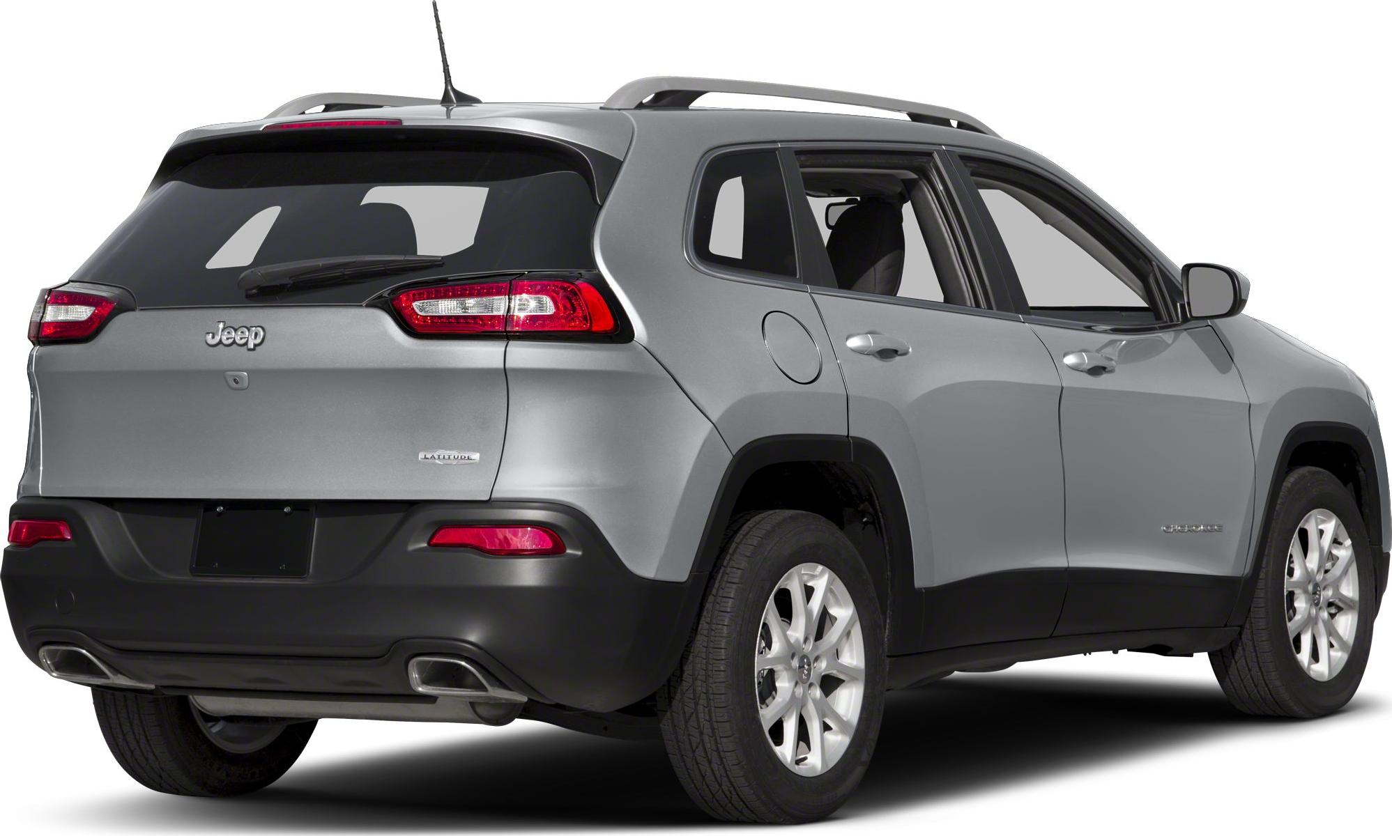 Rear view of SUV showing taillights, rear wiper, dual exhaust