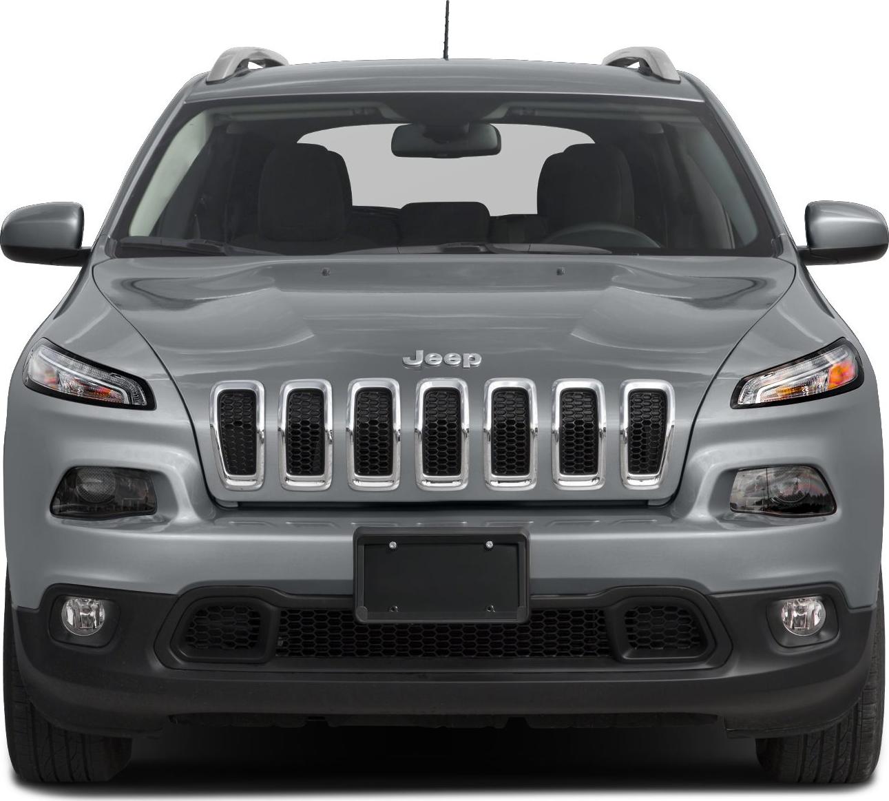 Front view with seven-slot grille and narrow headlights