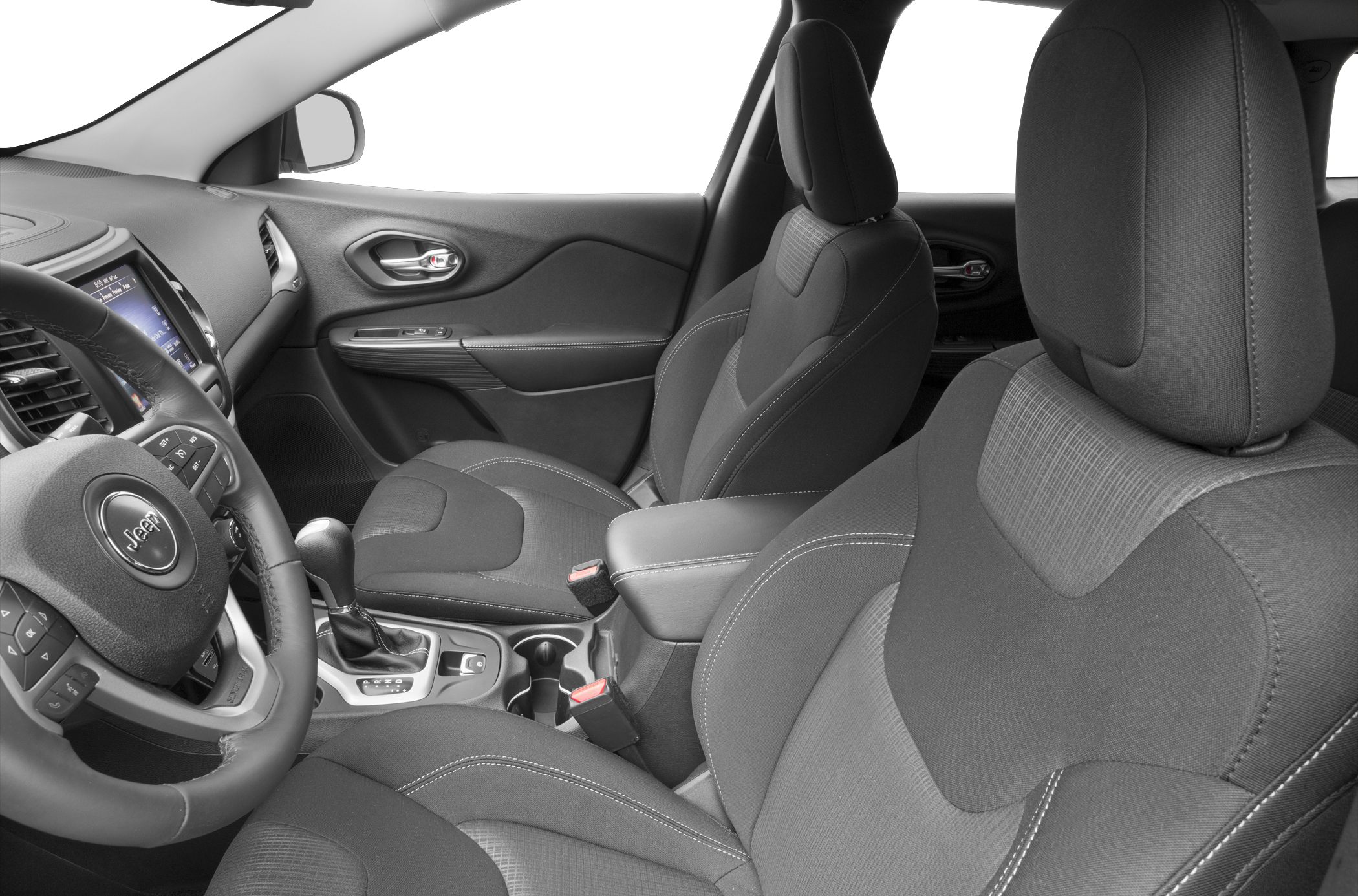Front fabric seats, dashboard, center console with gear shift