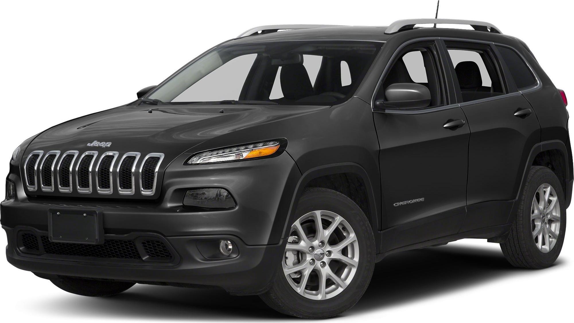 Front side view of black SUV with grille and roof rails
