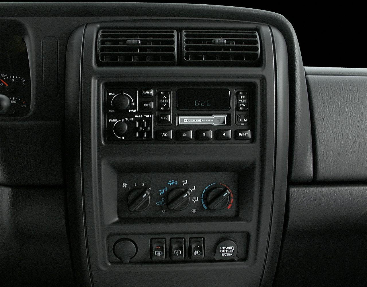 Dashboard with audio system and climate controls