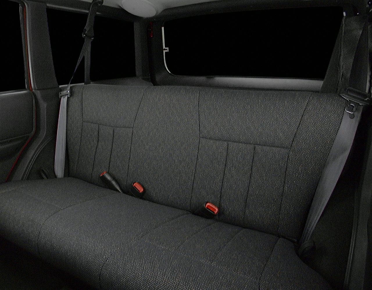 Rear seat fabric upholstery and seatbelt design