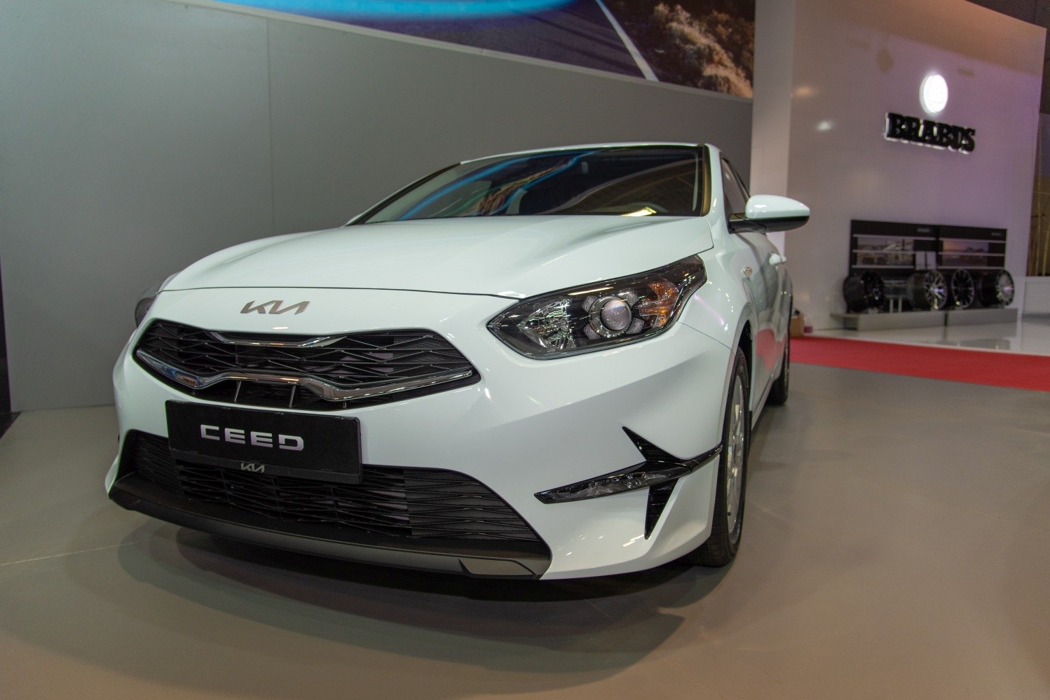 Front view with distinctive grille and sharp headlights