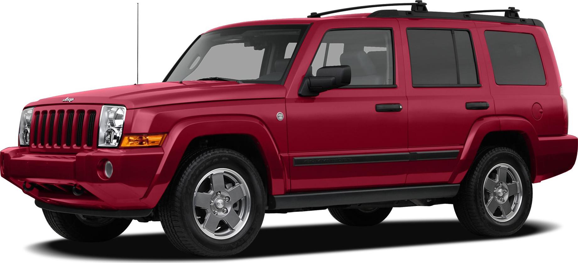 Boxy red SUV with prominent grille and roof racks