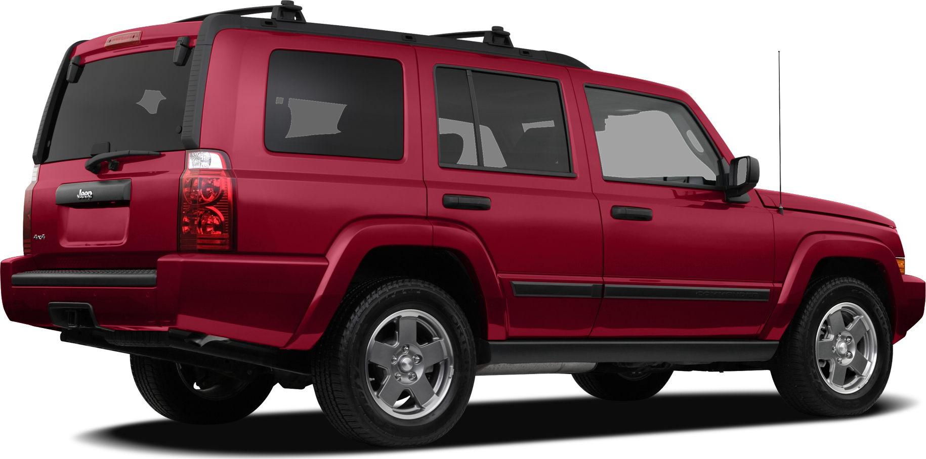 Red SUV with tinted windows, roof rails, and alloy wheels
