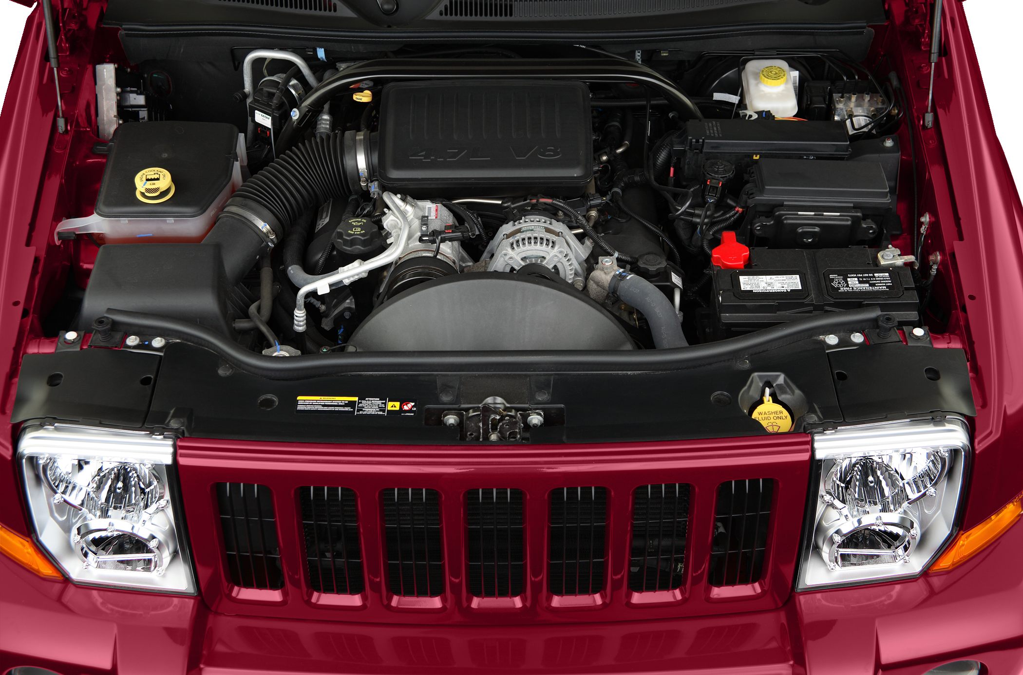 4.7L V8 engine with detailed components in engine bay.