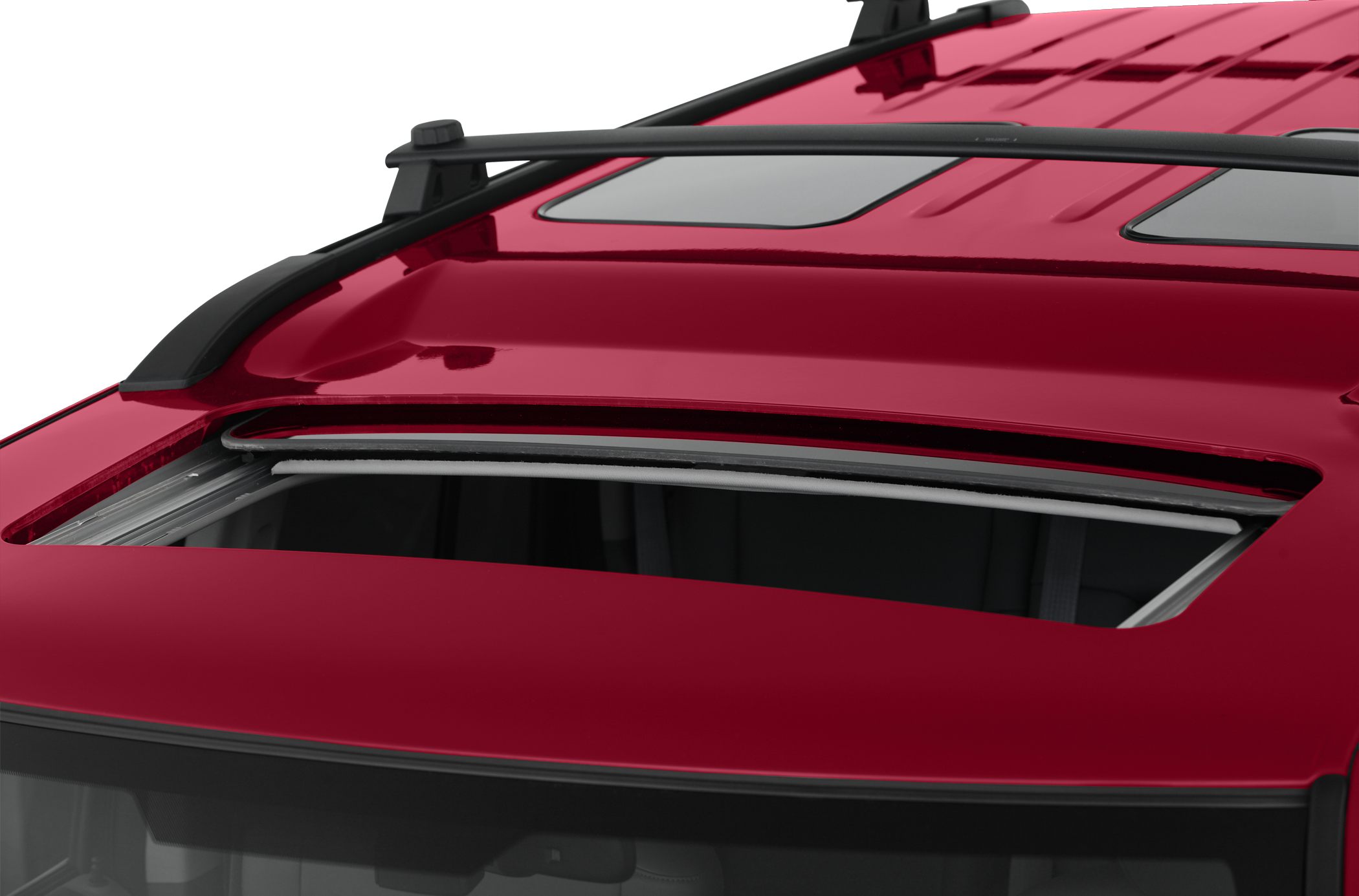 Car sunroof with roof rails on red exterior
