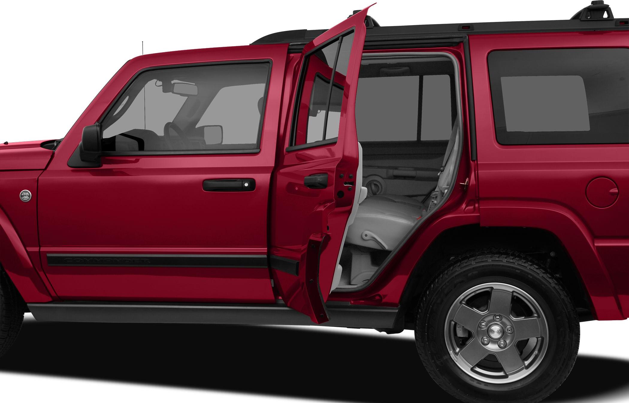 Side view of SUV with open rear door and alloy wheels