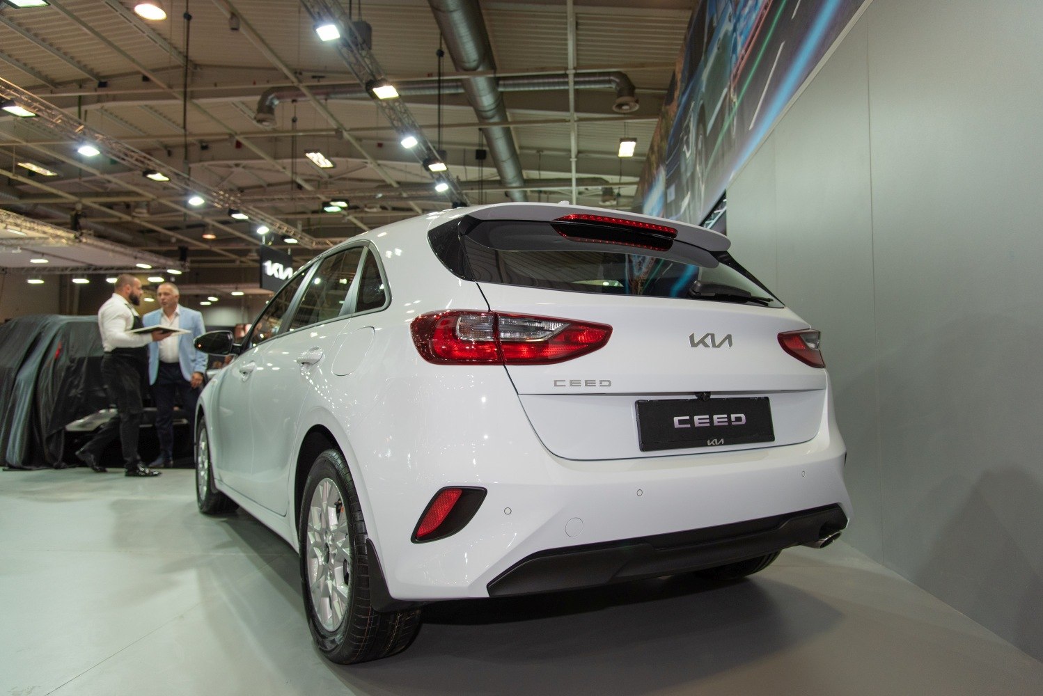 Rear view of hatchback with distinct taillights and spoiler