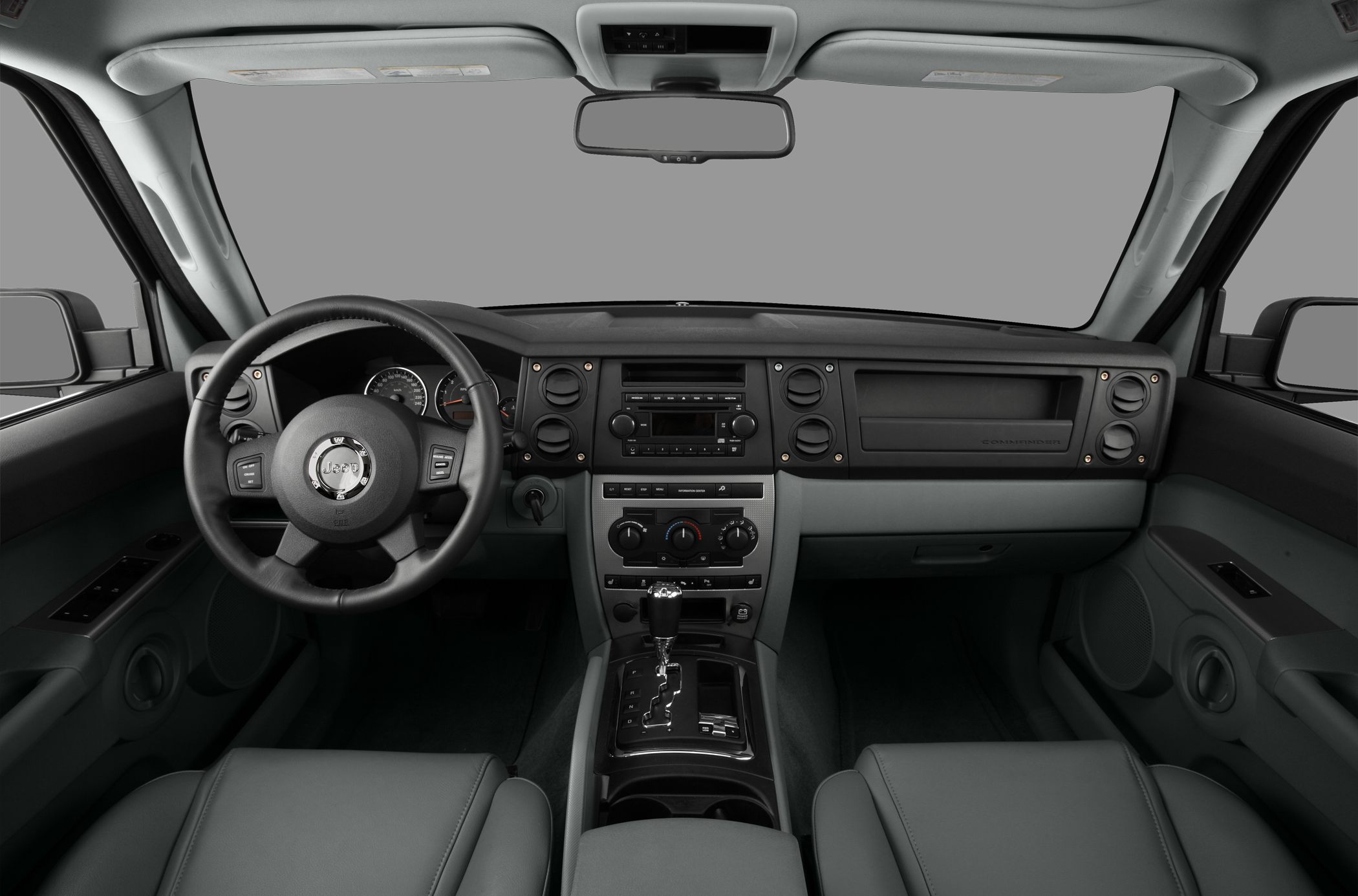 Dashboard layout with steering wheel and center console